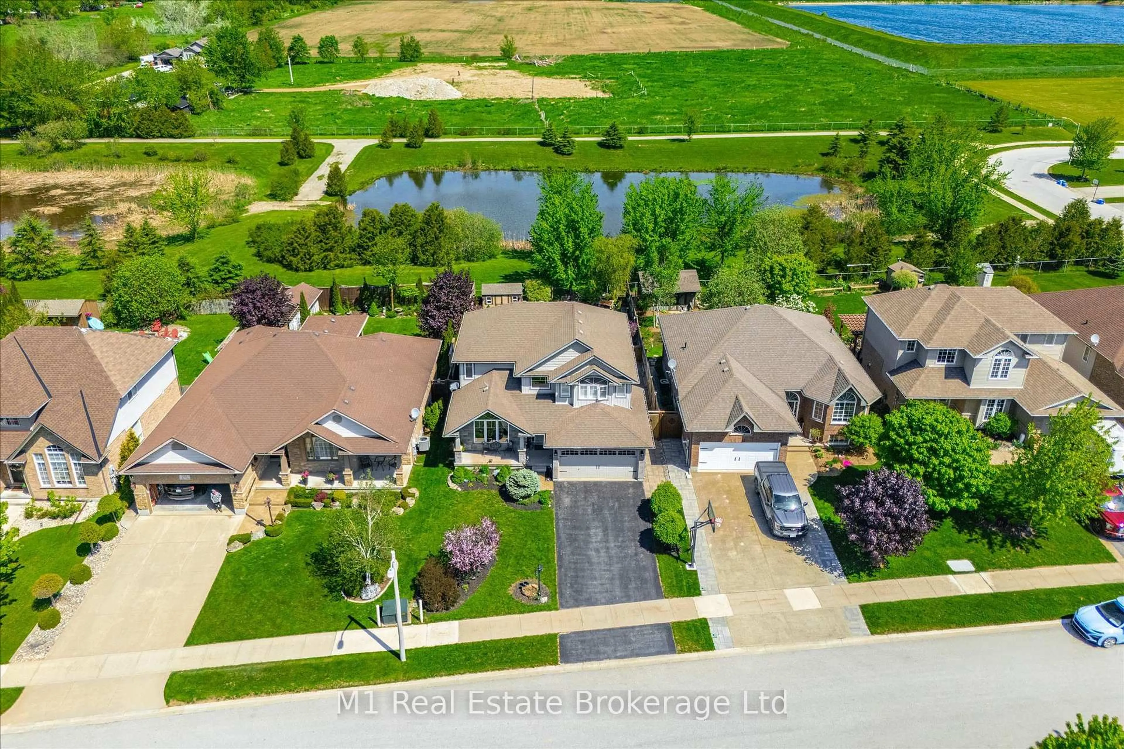 A pic from outside/outdoor area/front of a property/back of a property/a pic from drone, water/lake/river/ocean view for 237 Carrol St, Wellington North Ontario N0G 1A0