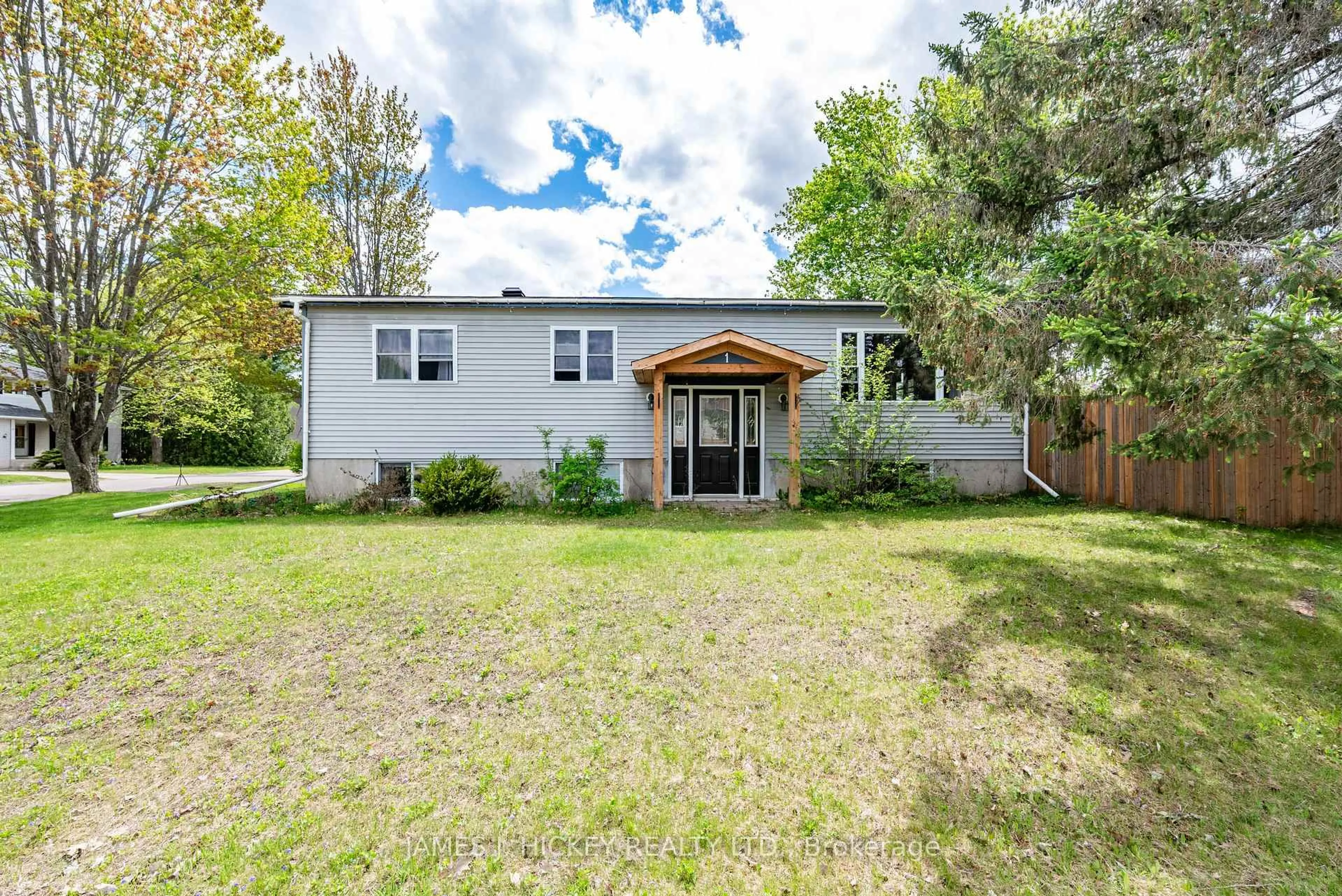 Home with vinyl exterior material, street for 1 Tamarack St, Deep River Ontario K0J 1P0