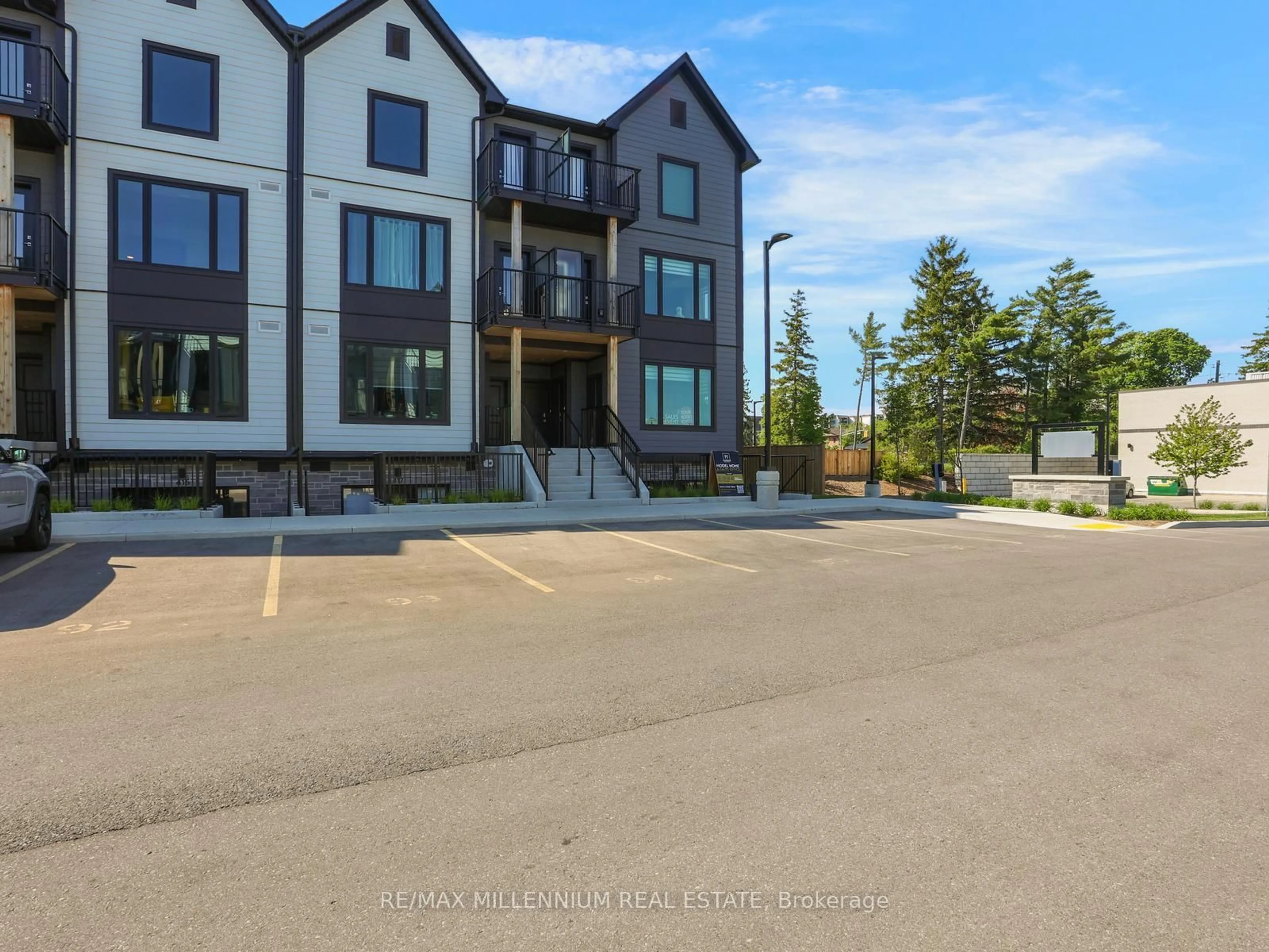 A pic from outside/outdoor area/front of a property/back of a property/a pic from drone, unknown for 708 Woolwich St #424, Guelph Ontario N1H 0C8