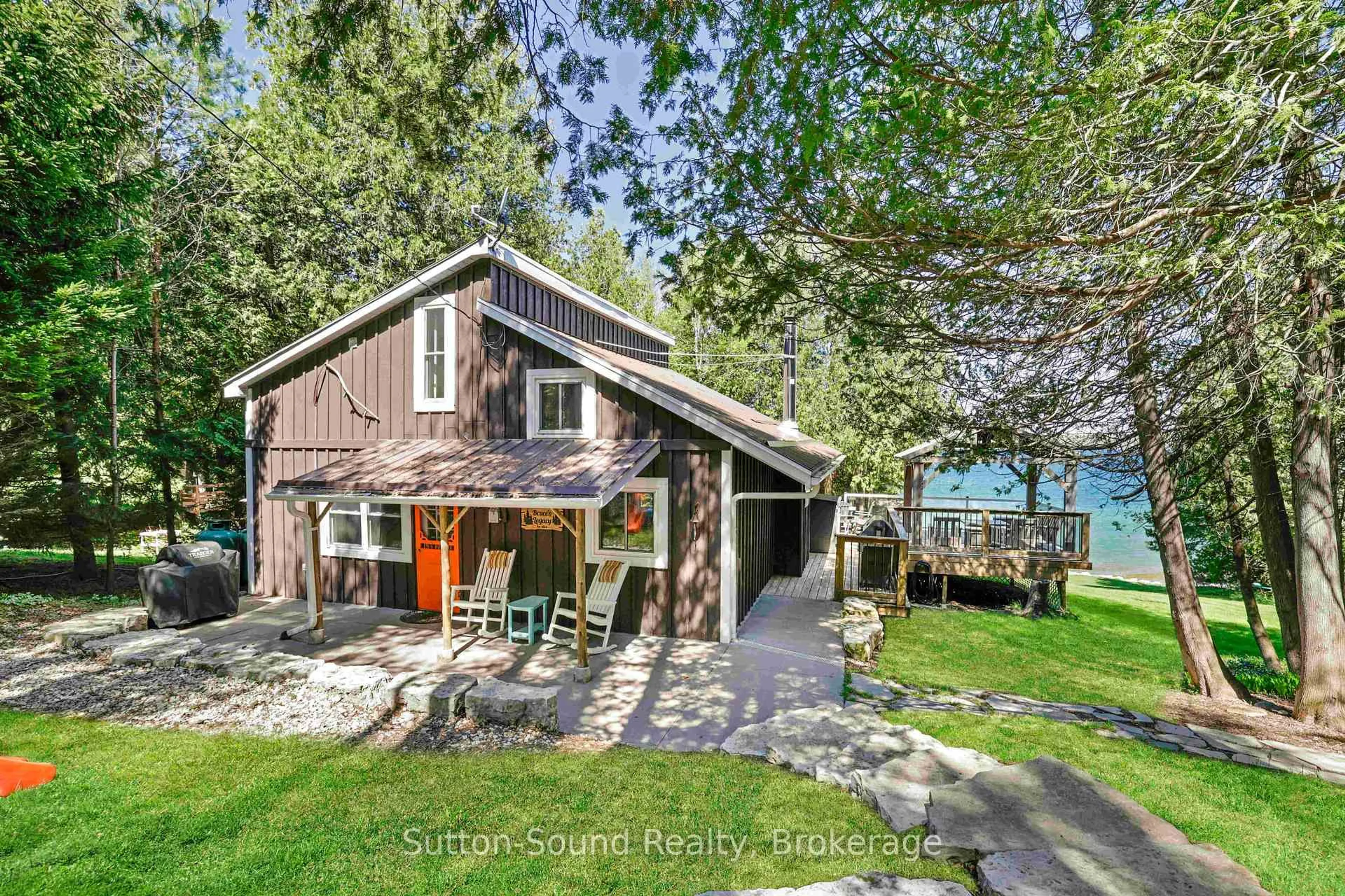 A pic from outside/outdoor area/front of a property/back of a property/a pic from drone, water/lake/river/ocean view for 109 Dahl St, Georgian Bluffs Ontario N0H 2T0