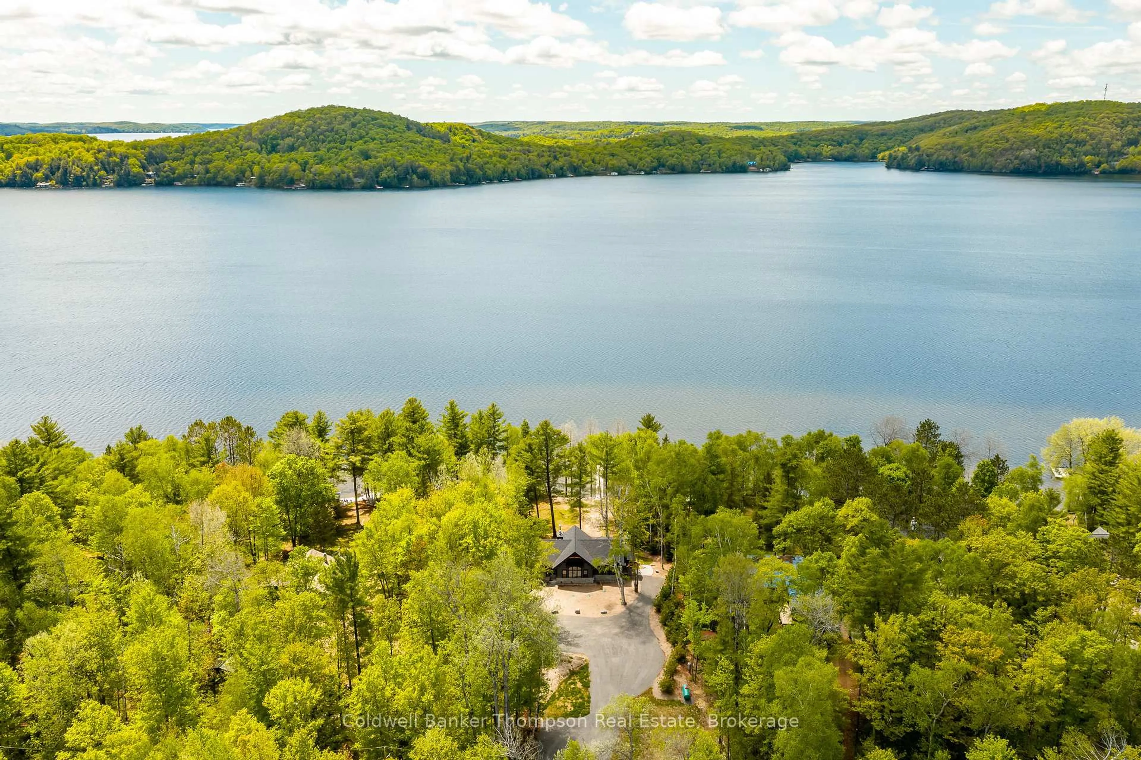A pic from outside/outdoor area/front of a property/back of a property/a pic from drone, water/lake/river/ocean view for 1204 Seabreeze Rd, Lake of Bays Ontario P0A 1H0