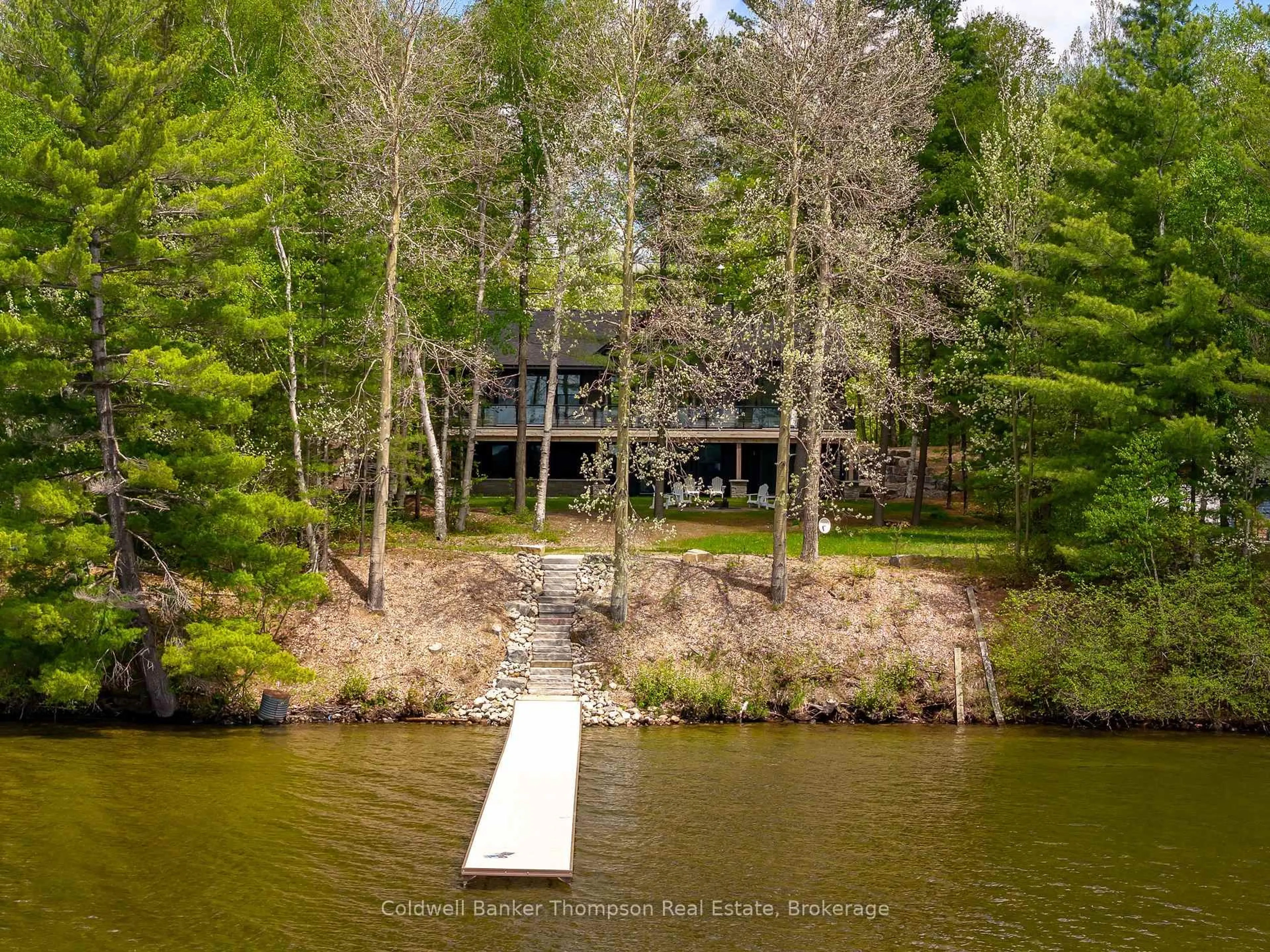 A pic from outside/outdoor area/front of a property/back of a property/a pic from drone, water/lake/river/ocean view for 1204 Seabreeze Rd, Lake of Bays Ontario P0A 1H0