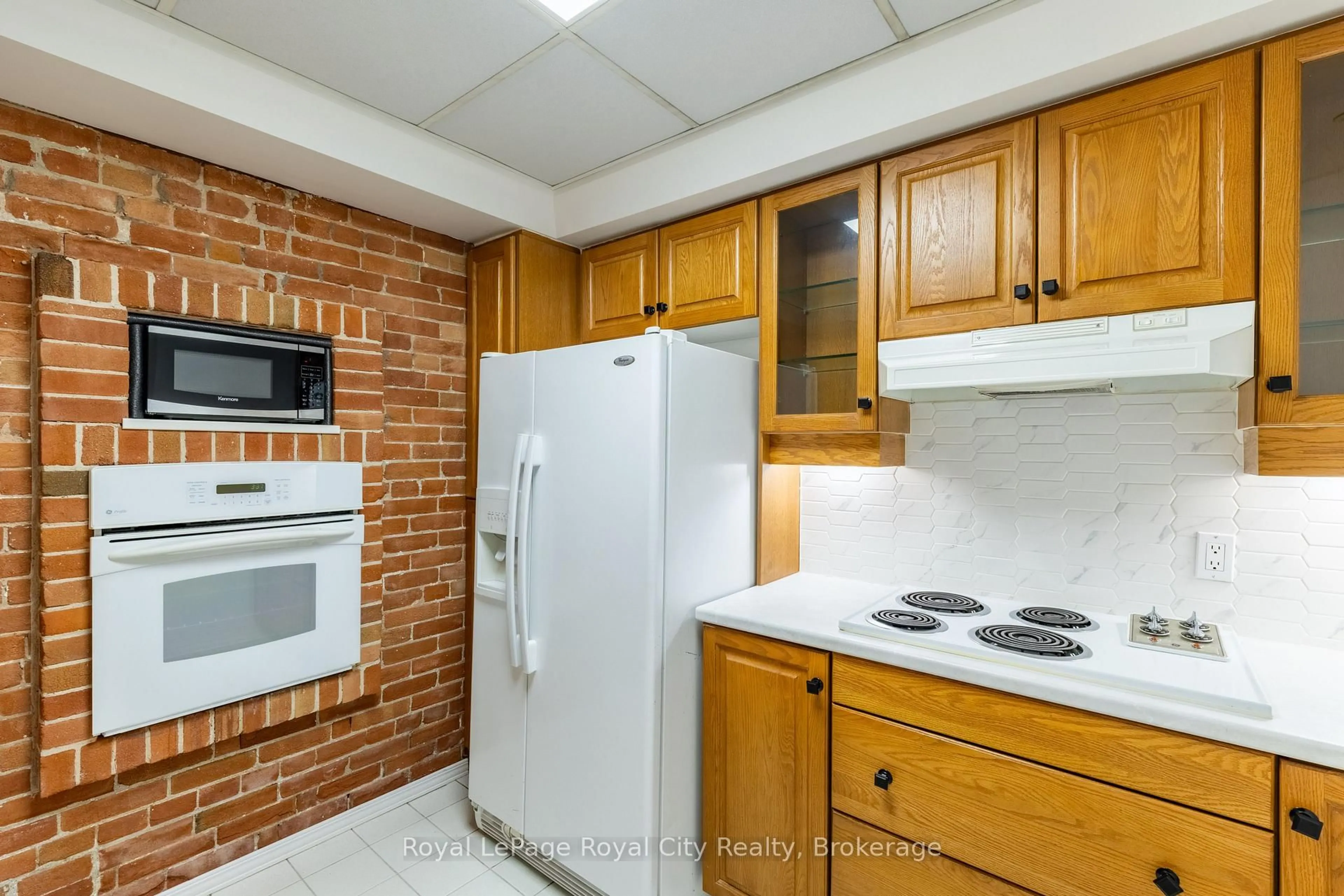 Standard kitchen, ceramic/tile floor for 57 Suffolk St #101, Guelph Ontario N1H 2J1