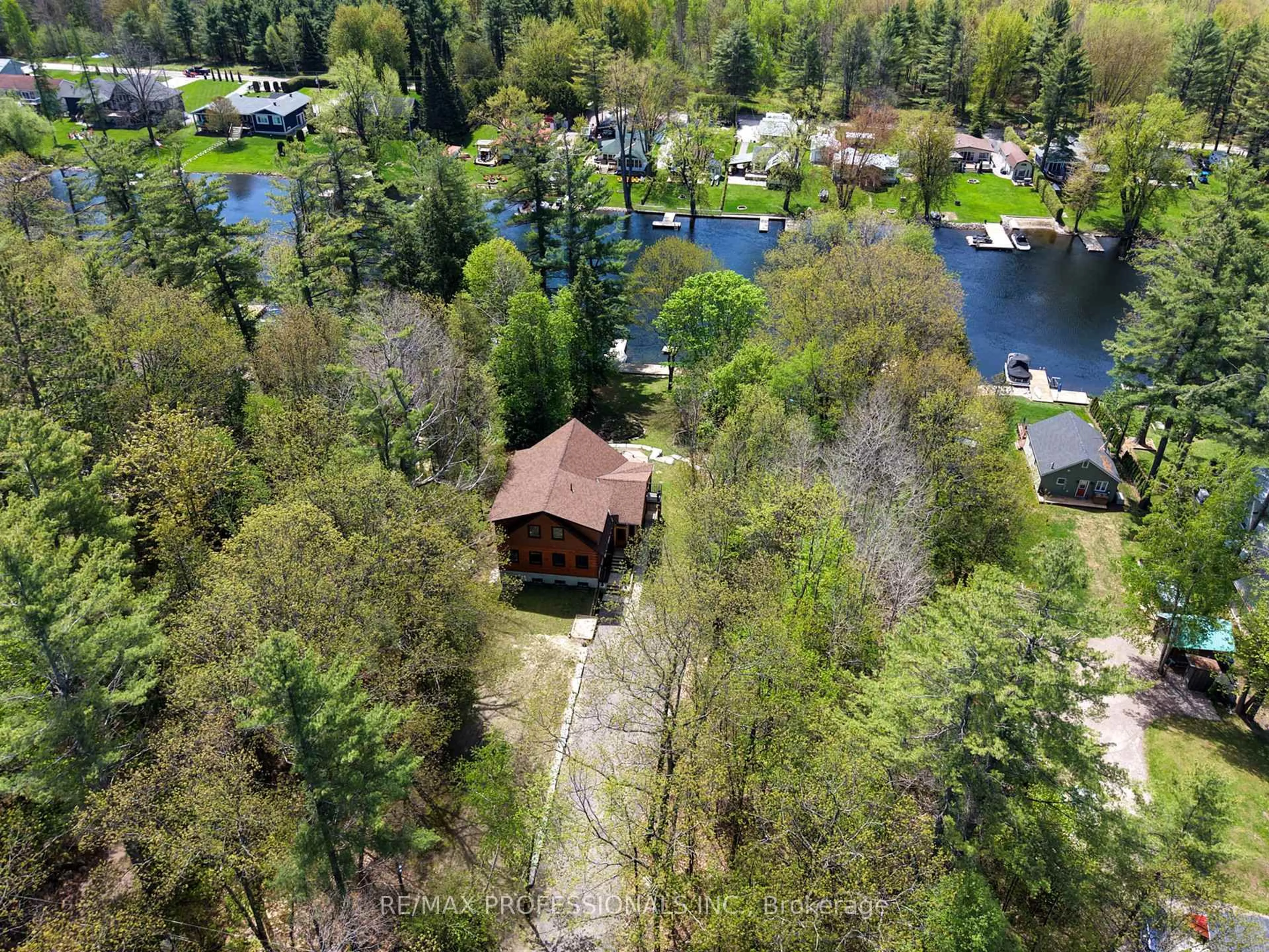 A pic from outside/outdoor area/front of a property/back of a property/a pic from drone, water/lake/river/ocean view for 1048 Bagley Rd, Gravenhurst Ontario P0E 1N0
