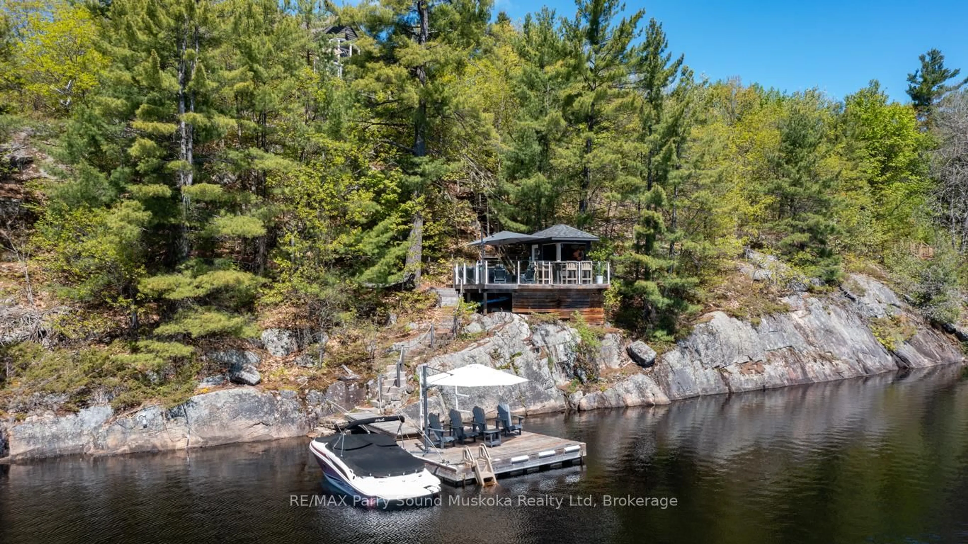 A pic from outside/outdoor area/front of a property/back of a property/a pic from drone, water/lake/river/ocean view for 219 Dunchurch Estates Rd, Whitestone Ontario P0A 1G0