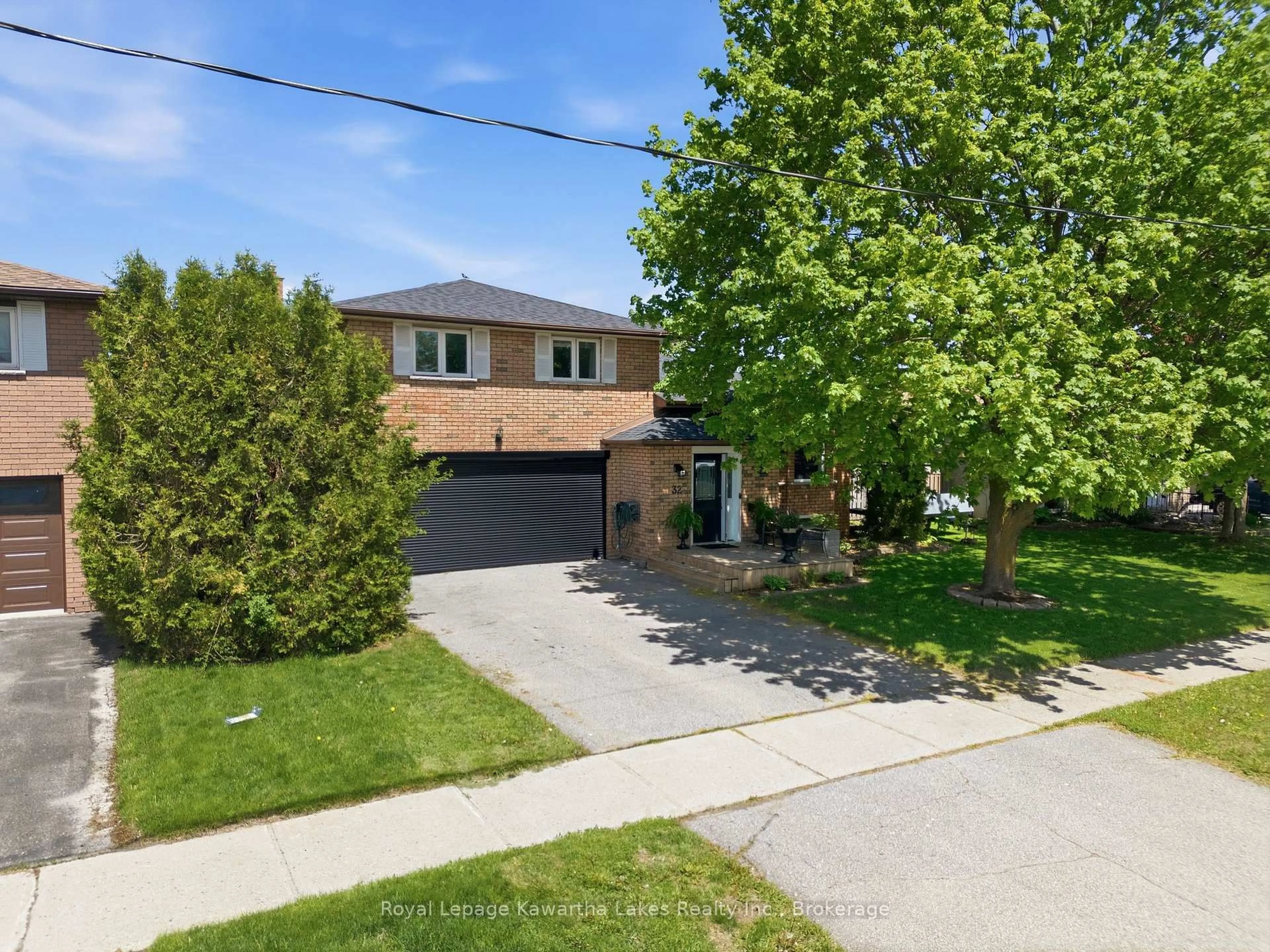 A pic from outside/outdoor area/front of a property/back of a property/a pic from drone, street for 32 Andrew Dr, Kawartha Lakes Ontario K9V 5W6