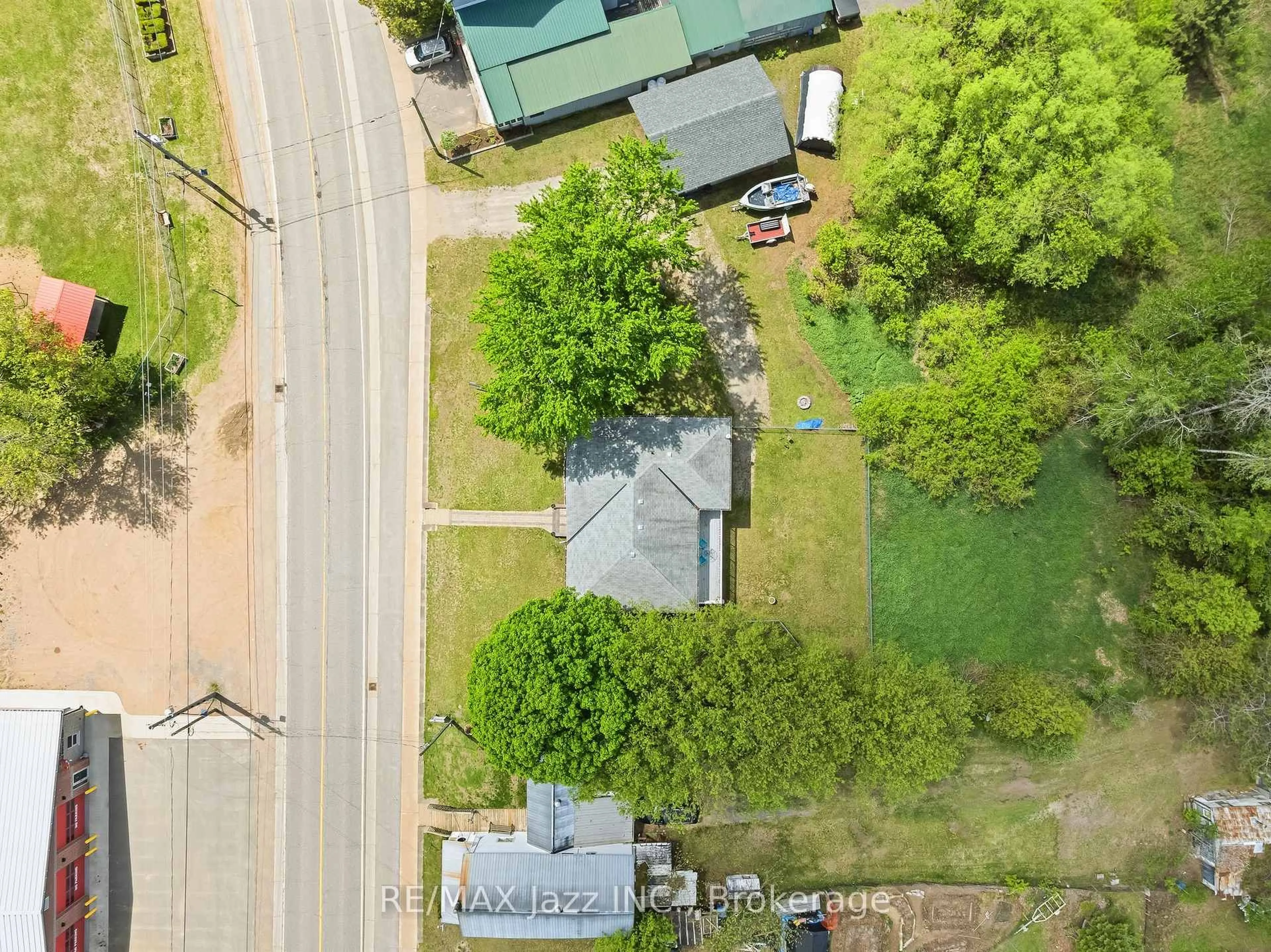 A pic from outside/outdoor area/front of a property/back of a property/a pic from drone, street for 5492 Hwy 620, Coe Hill Ontario K0L 1P0