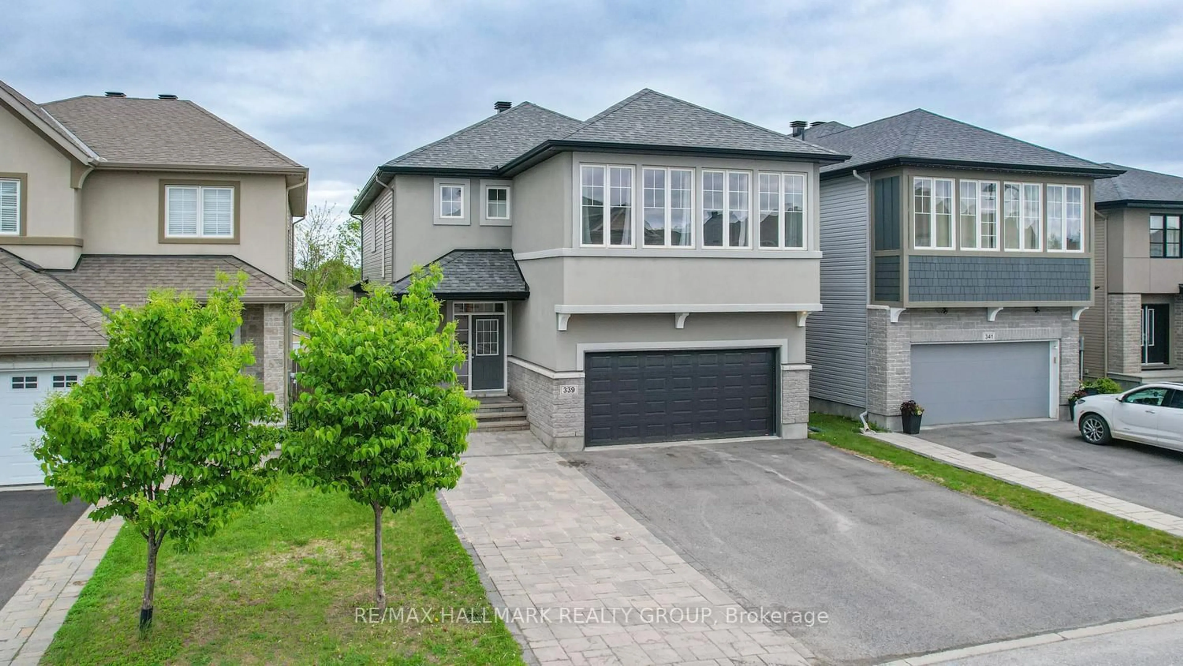 Home with brick exterior material, street for 339 Andalusian Cres, Ottawa Ontario K2V 0C2