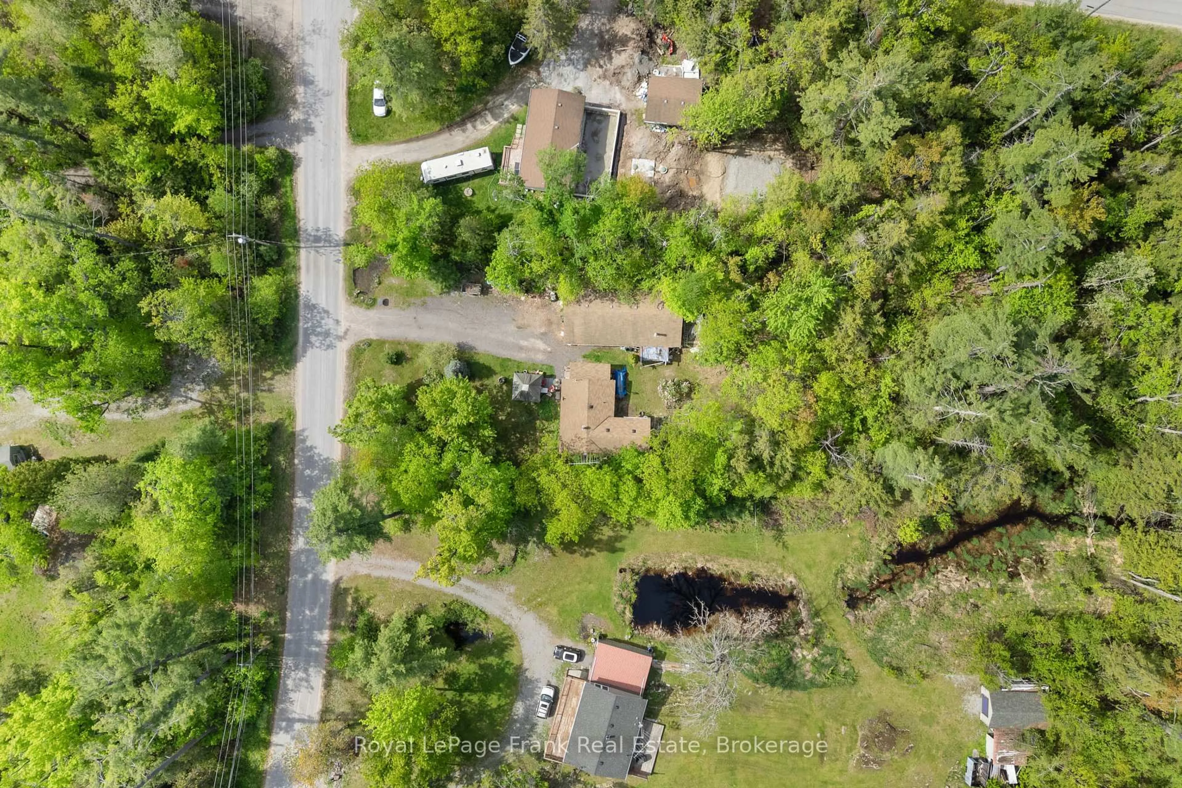 A pic from outside/outdoor area/front of a property/back of a property/a pic from drone, unknown for 454 Kennedy Dr, Trent Lakes Ontario K0M 1A0