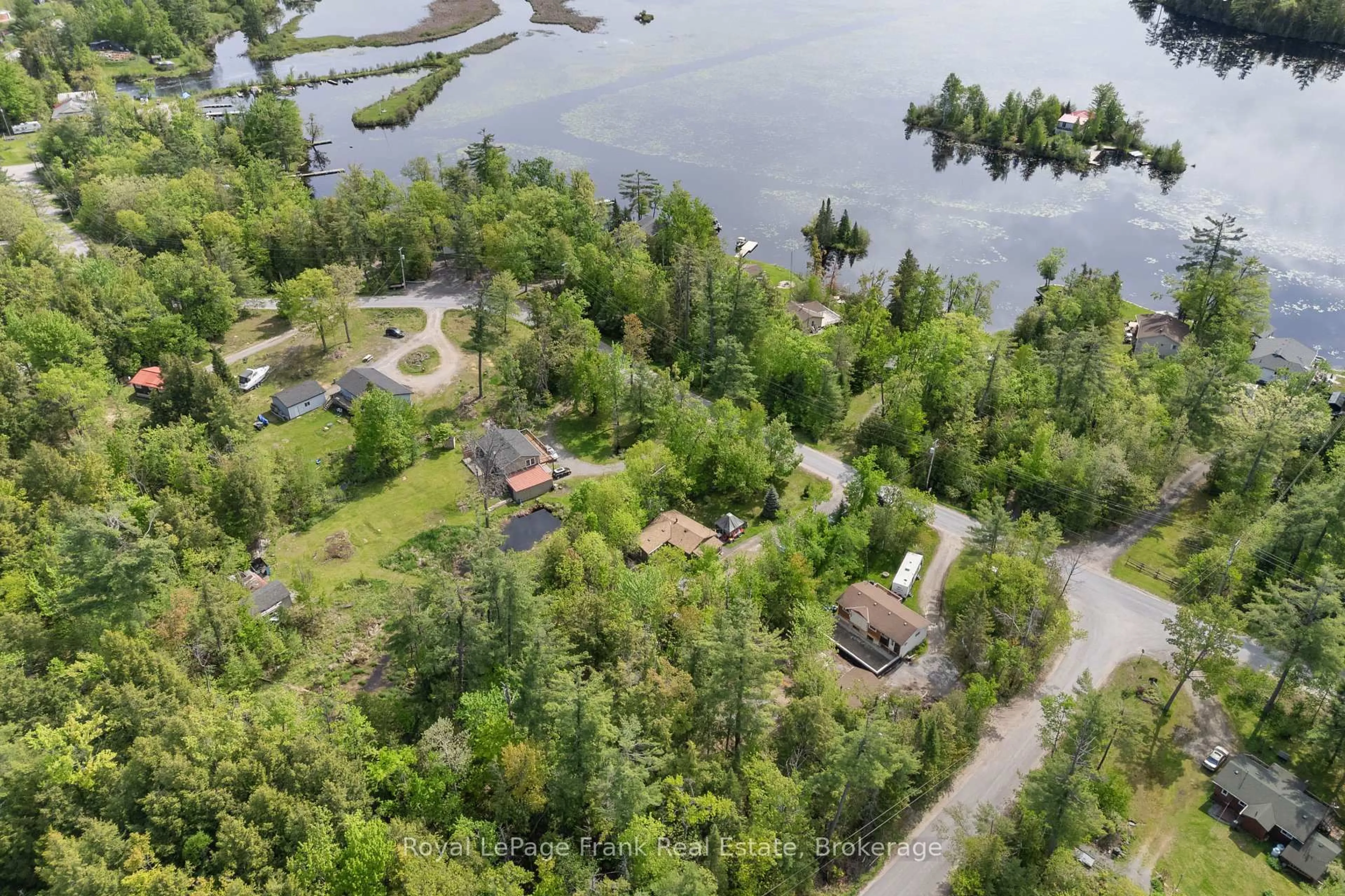 A pic from outside/outdoor area/front of a property/back of a property/a pic from drone, water/lake/river/ocean view for 454 Kennedy Dr, Trent Lakes Ontario K0M 1A0