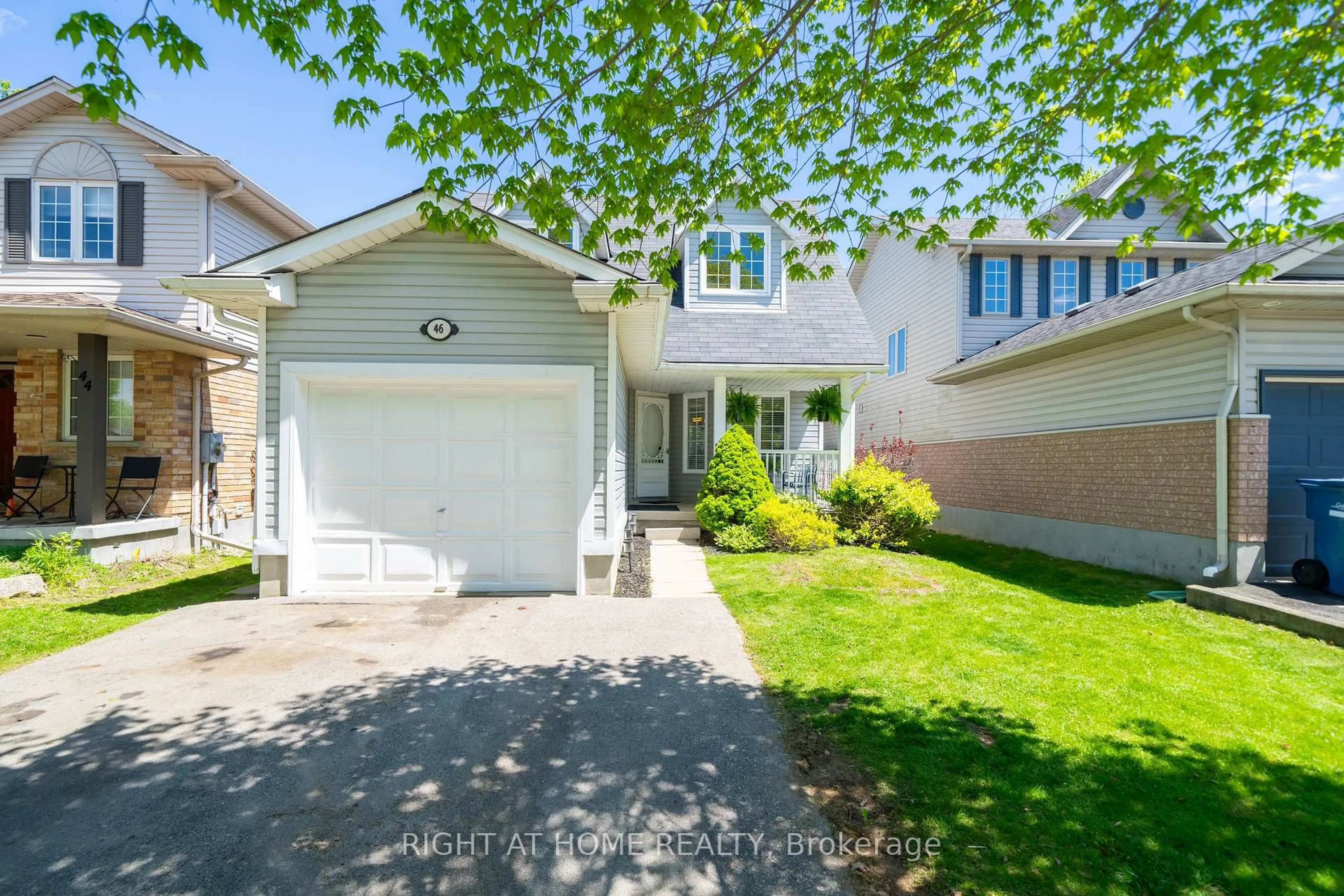 Home with vinyl exterior material, street for 46 Waxwing Cres, Guelph Ontario N1C 1E3