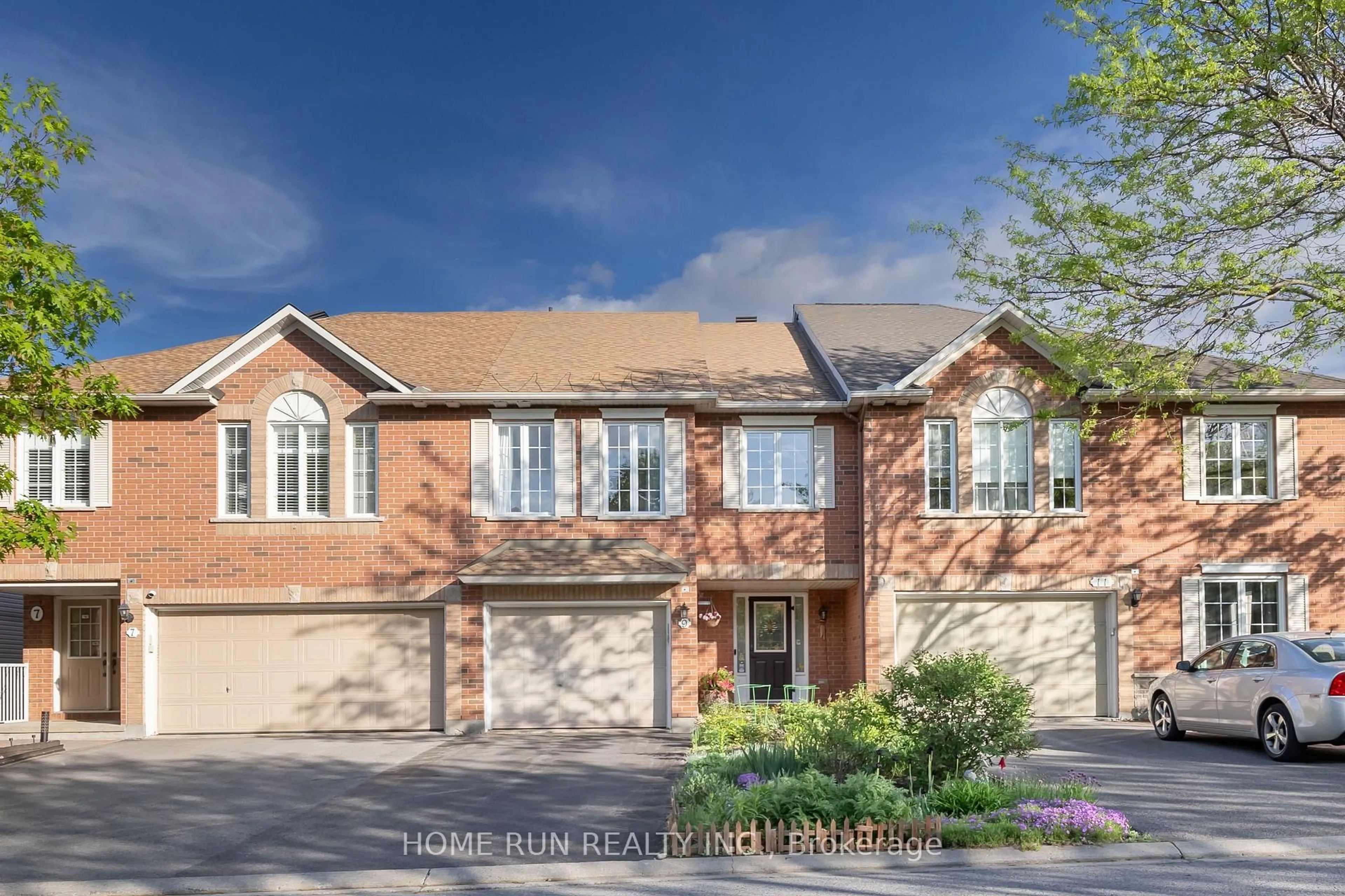 Home with brick exterior material, street for 9 Macassa Circ, Ottawa Ontario K2T 1J7