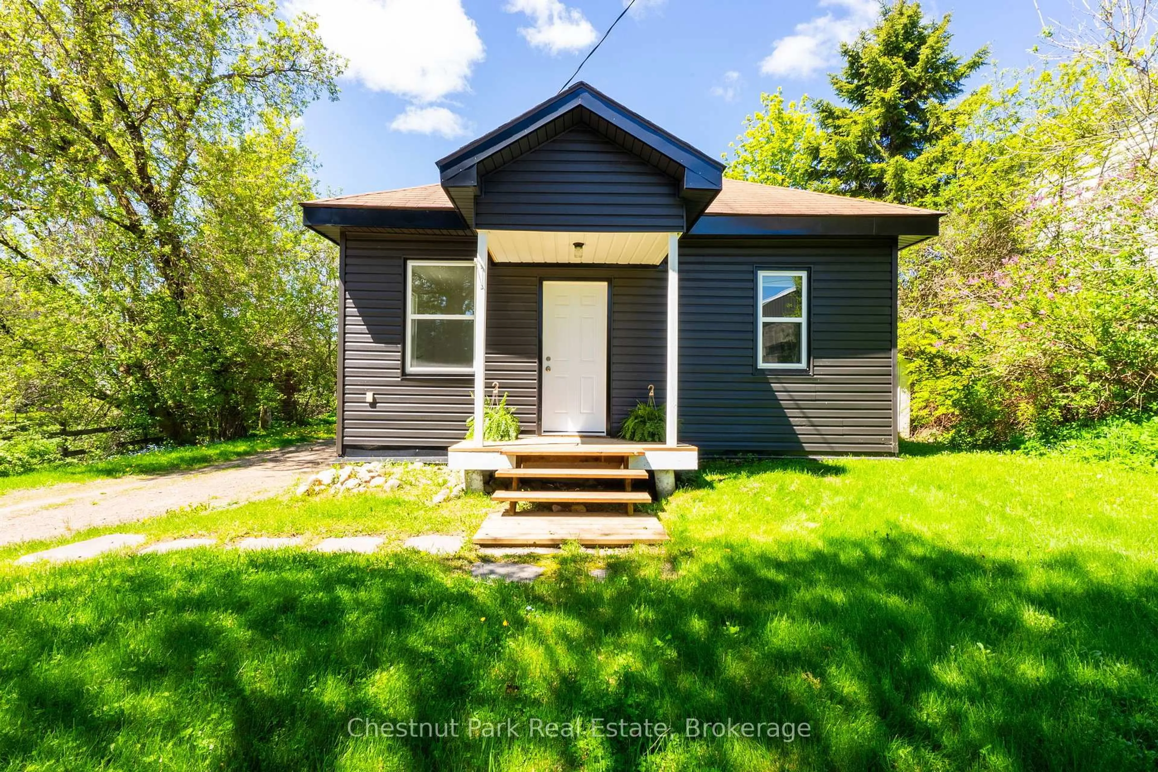 Home with vinyl exterior material, street for 203 Centre St, Burk's Falls Ontario P0A 1C0