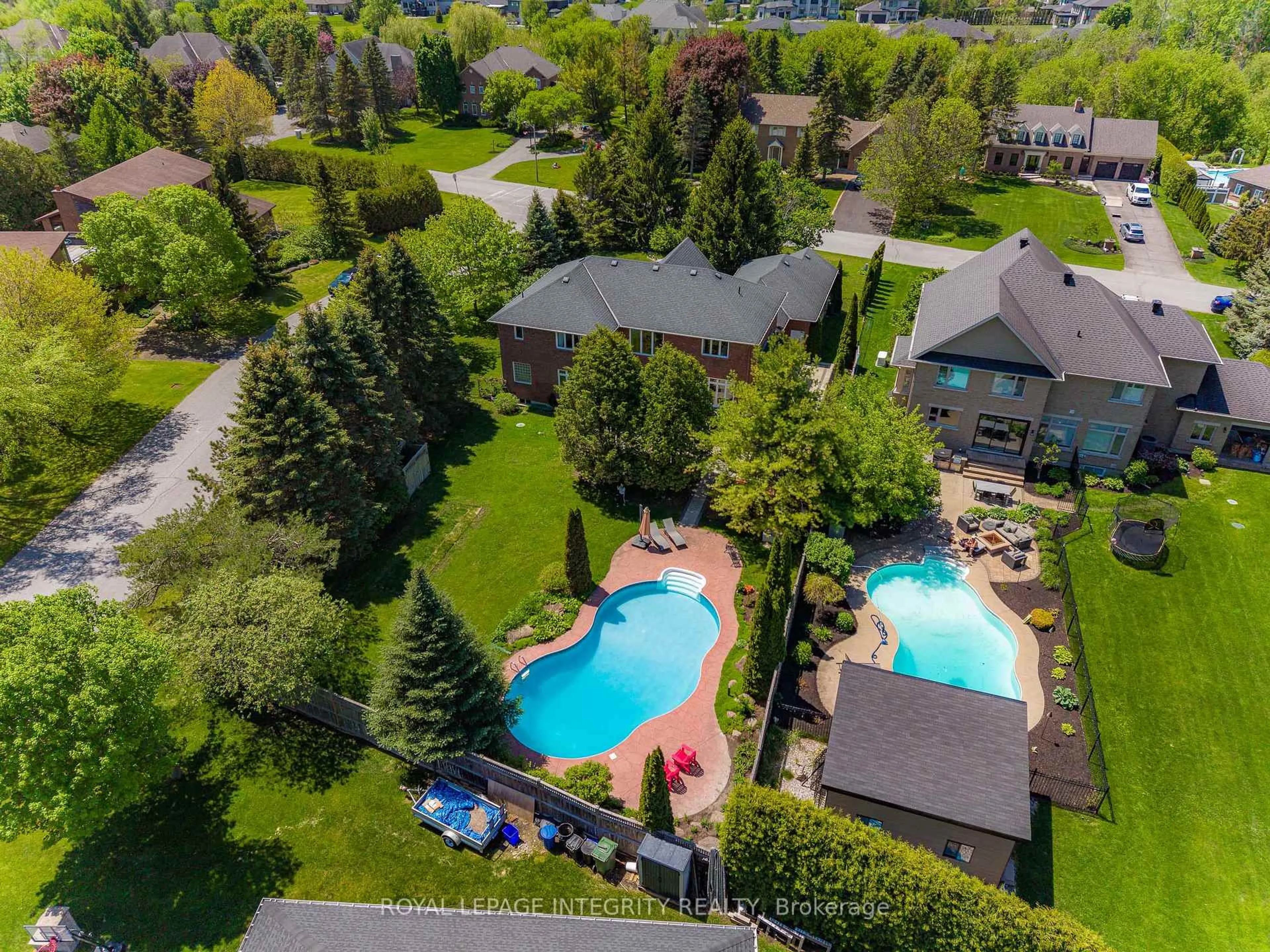 A pic from outside/outdoor area/front of a property/back of a property/a pic from drone, water/lake/river/ocean view for 5589 Carrison Dr, Manotick Ontario K4M 1K7