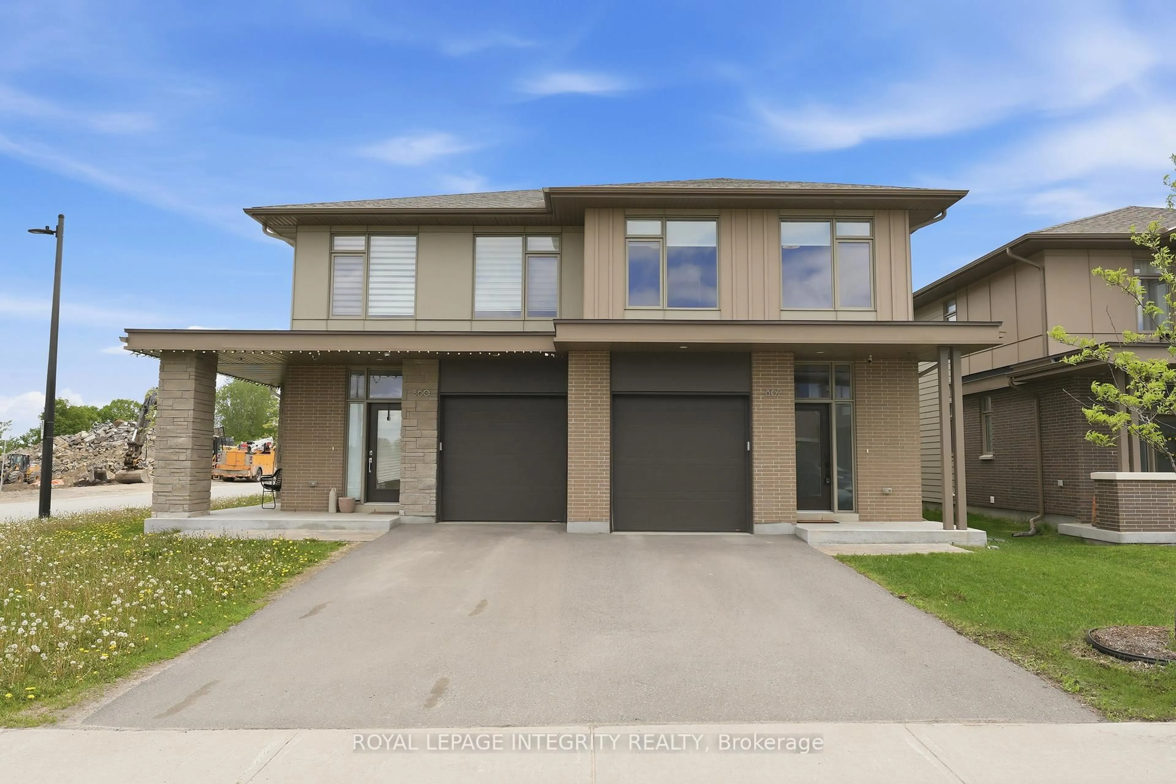 Home with brick exterior material, street for 862 Moses Tennisco St, Ottawa Ontario K1K 5A2