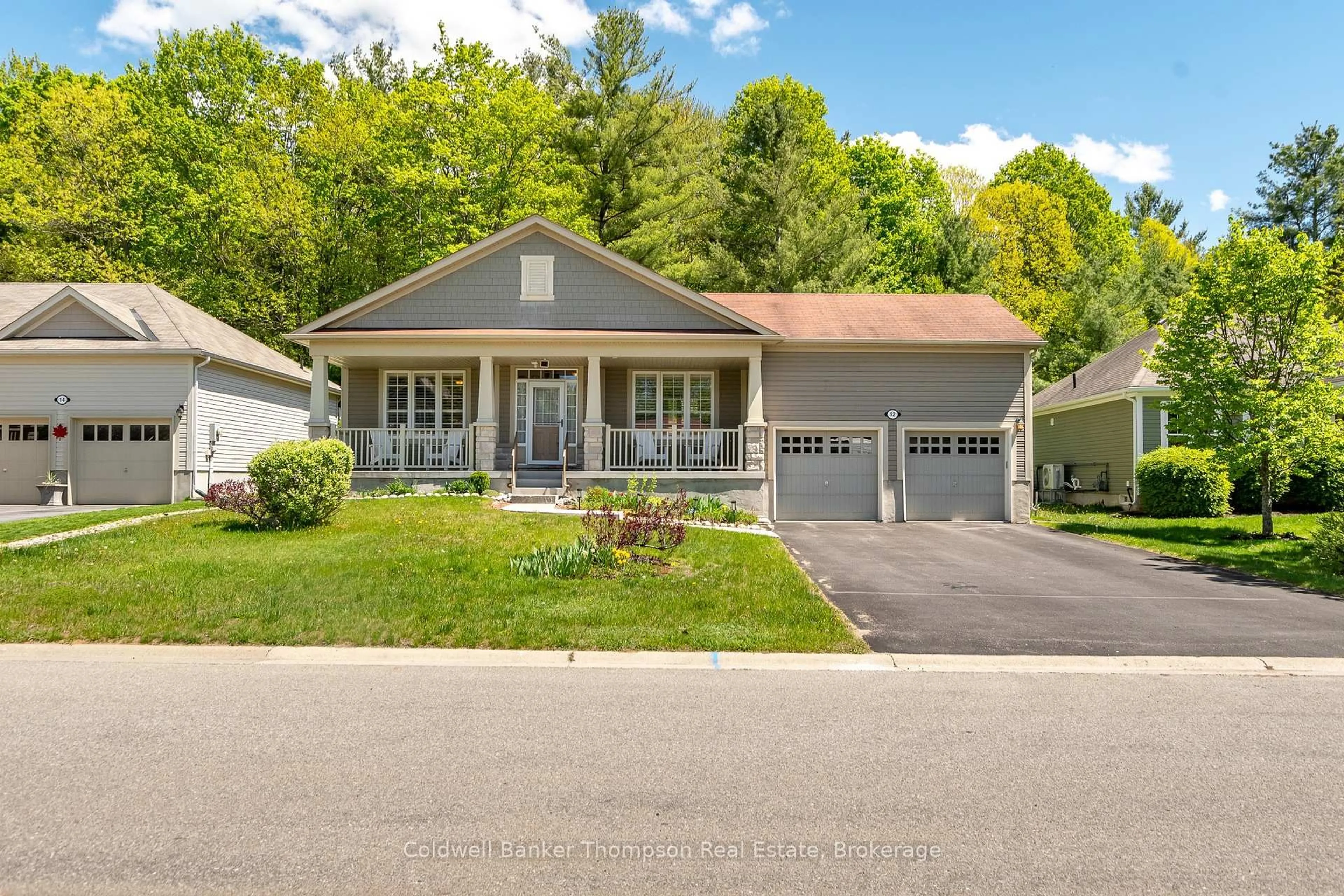Home with vinyl exterior material, street for 12 Heron's Hill, Bracebridge Ontario P1L 0A9