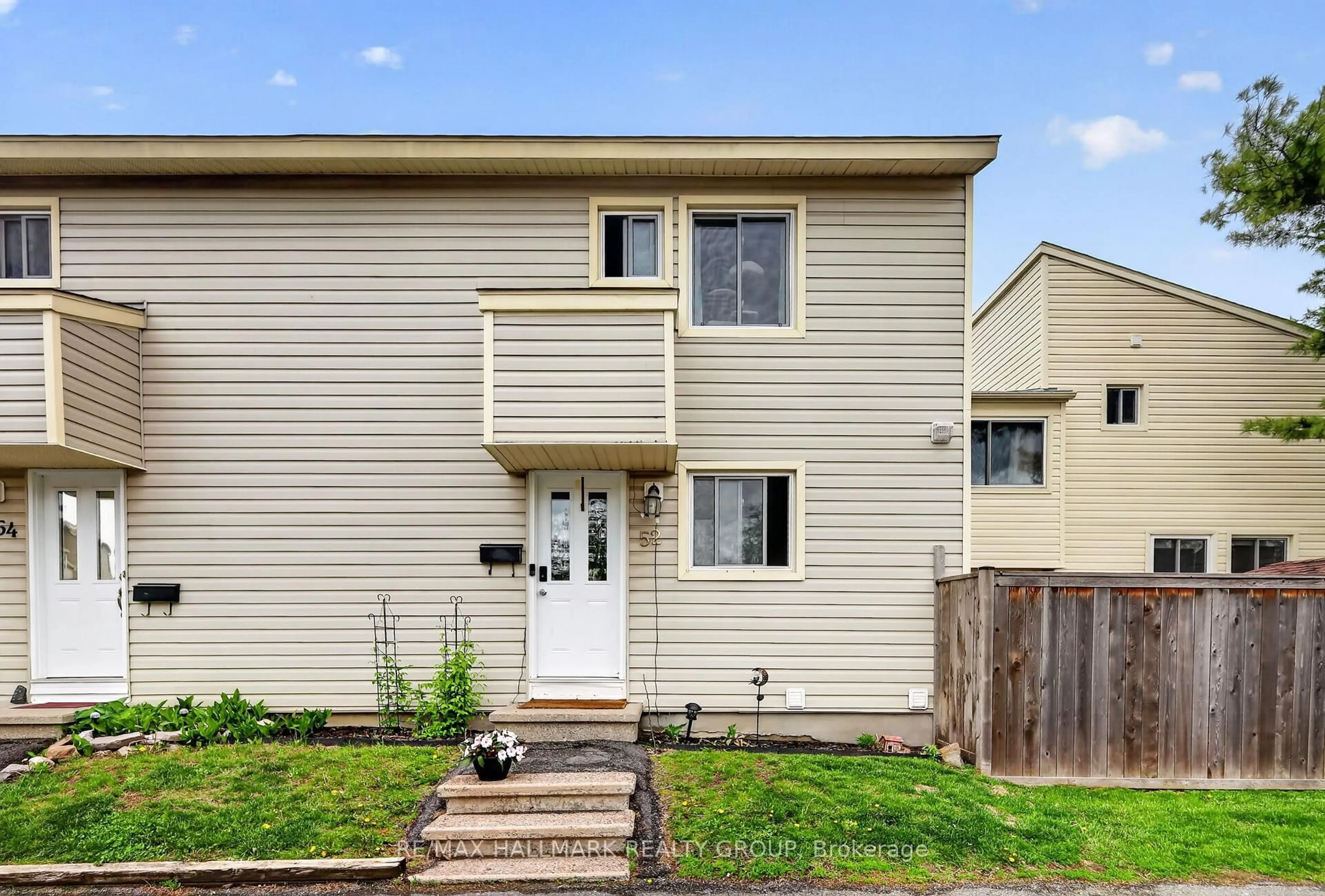 Home with vinyl exterior material, street for 52 Thistledown Crt, Ottawa Ontario K2J 1M9