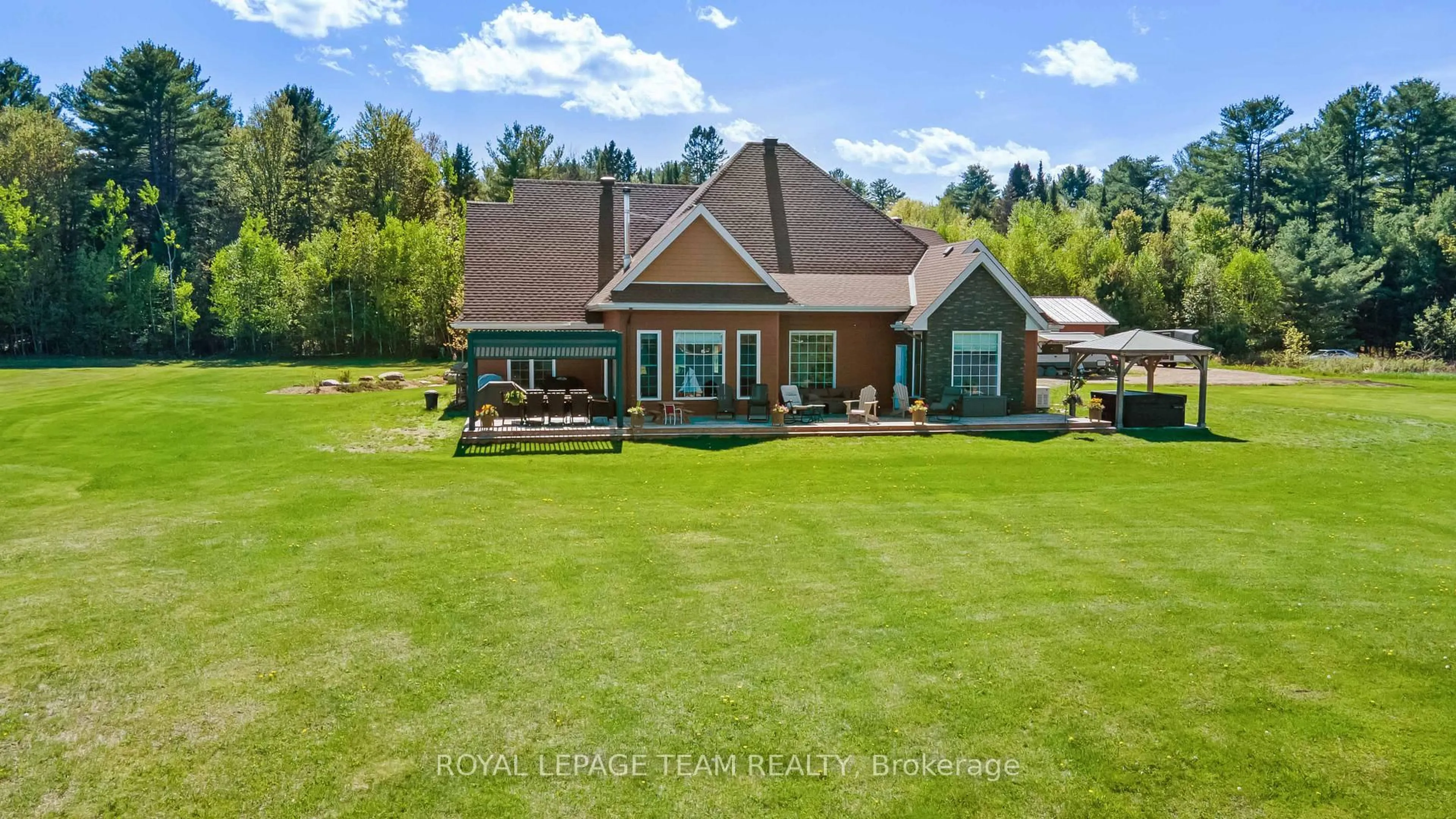 A pic from outside/outdoor area/front of a property/back of a property/a pic from drone, water/lake/river/ocean view for 43 Green Gate Lane, Golden Lake Ontario K0J 1X0