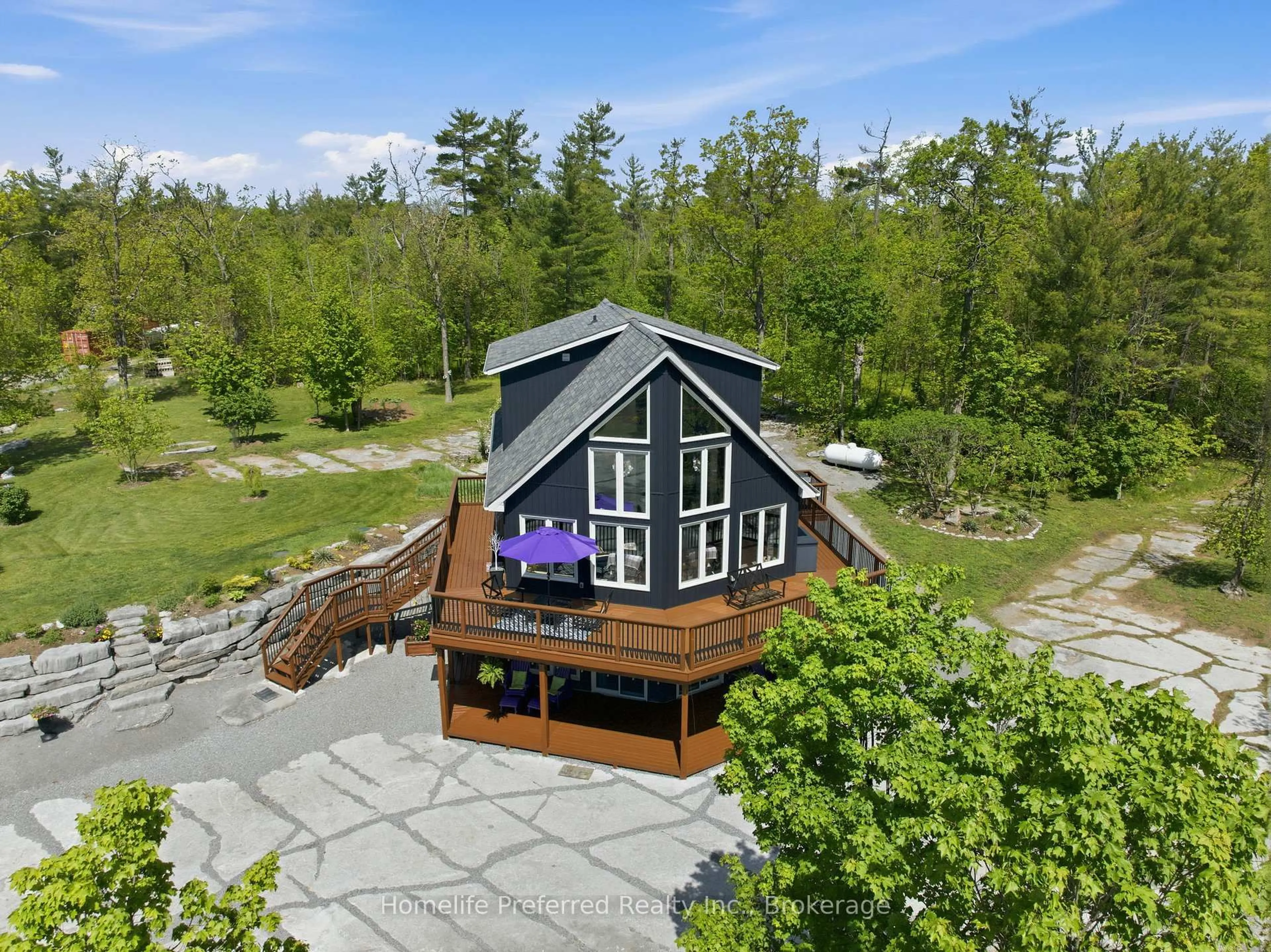 A pic from outside/outdoor area/front of a property/back of a property/a pic from drone, unknown for 6070 28 Highway, North Kawartha Ontario K0L 3E0