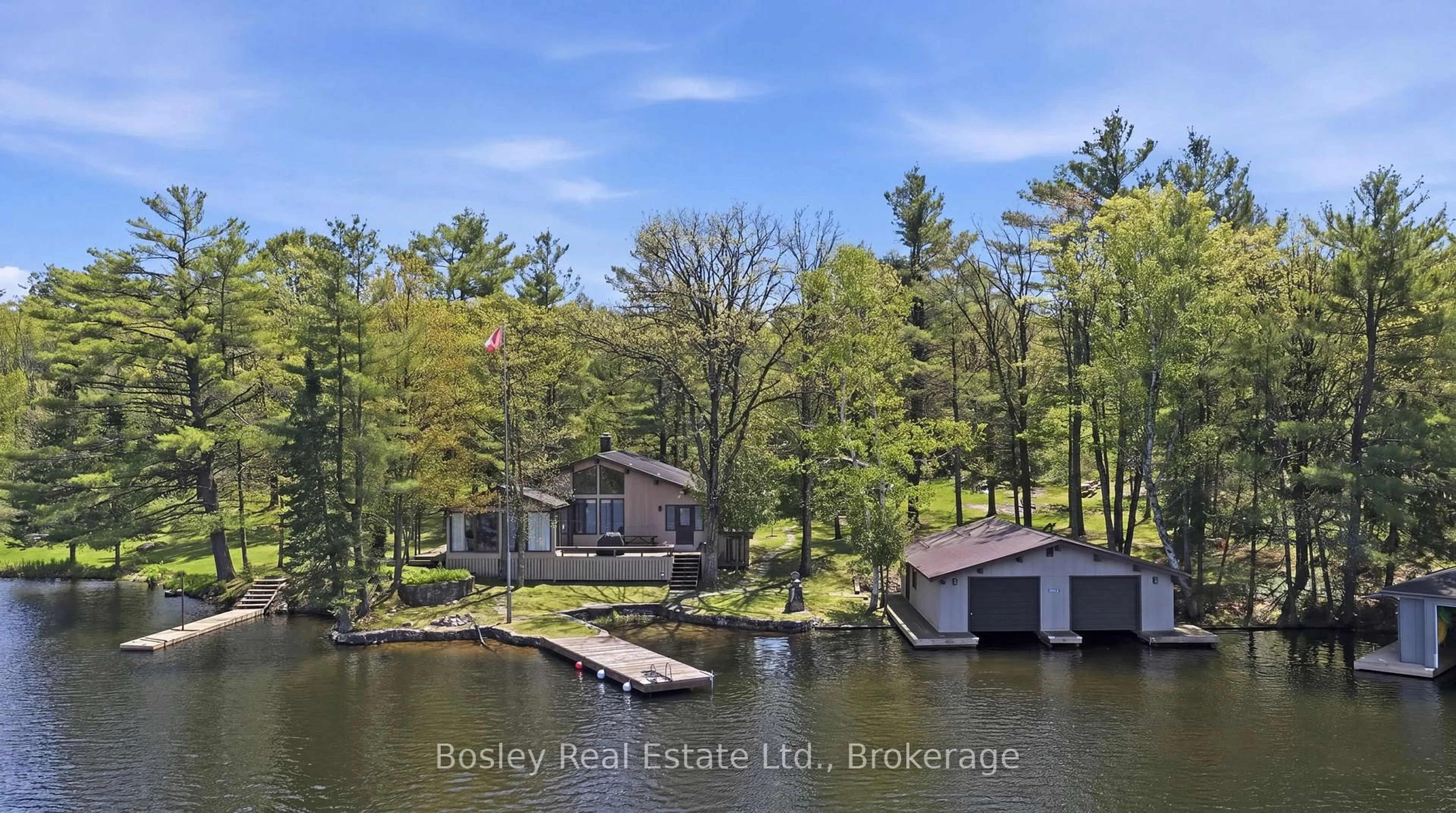 A pic from outside/outdoor area/front of a property/back of a property/a pic from drone, water/lake/river/ocean view for 7 SR405 Shore, Muskoka Lakes Ontario P0C 1M0