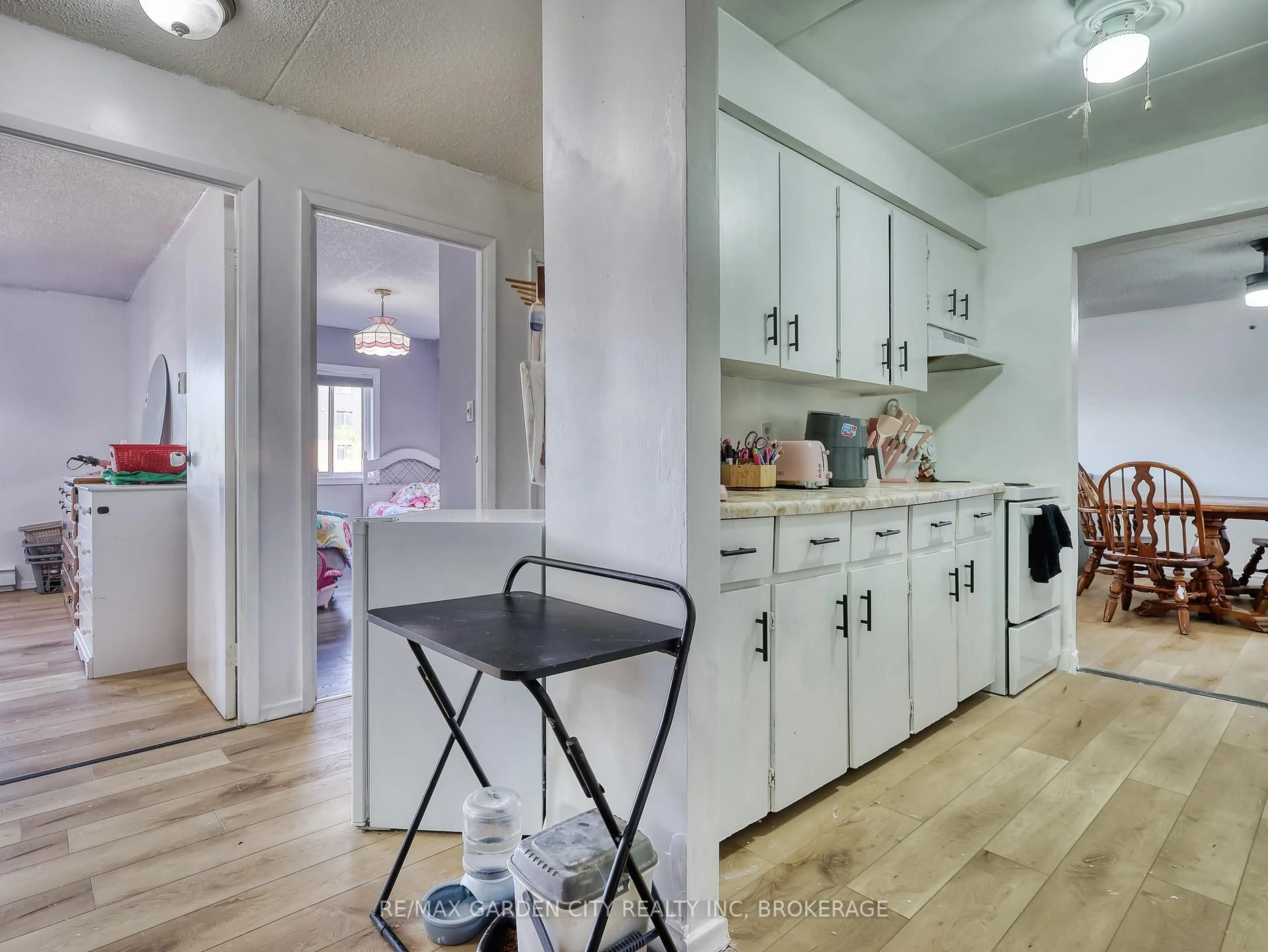 Kitchen with laundary machines, unknown for 72 Main St #211, Port Colborne Ontario L3K 5Z8