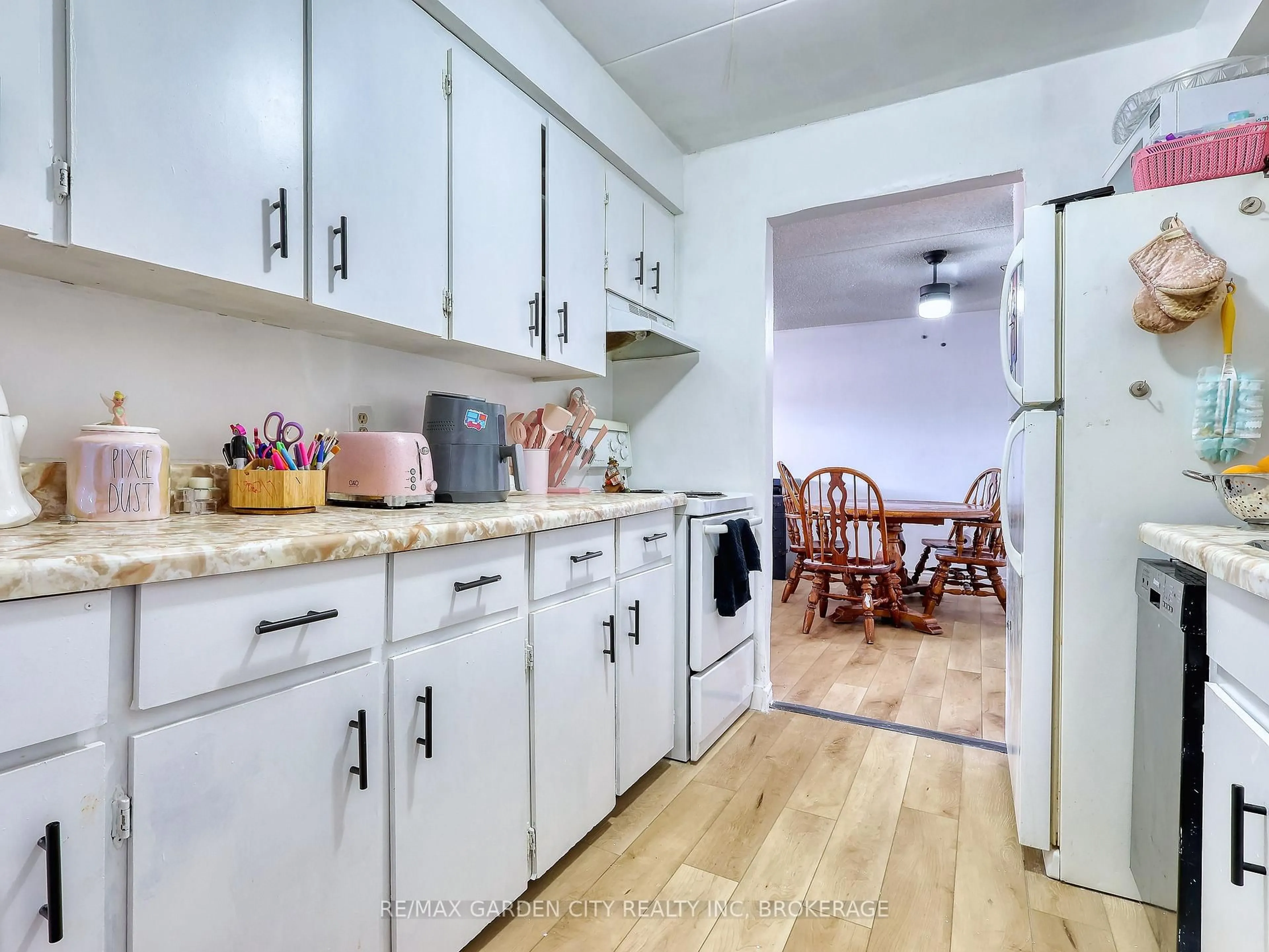 Kitchen with laundary machines, unknown for 72 Main St #211, Port Colborne Ontario L3K 5Z8
