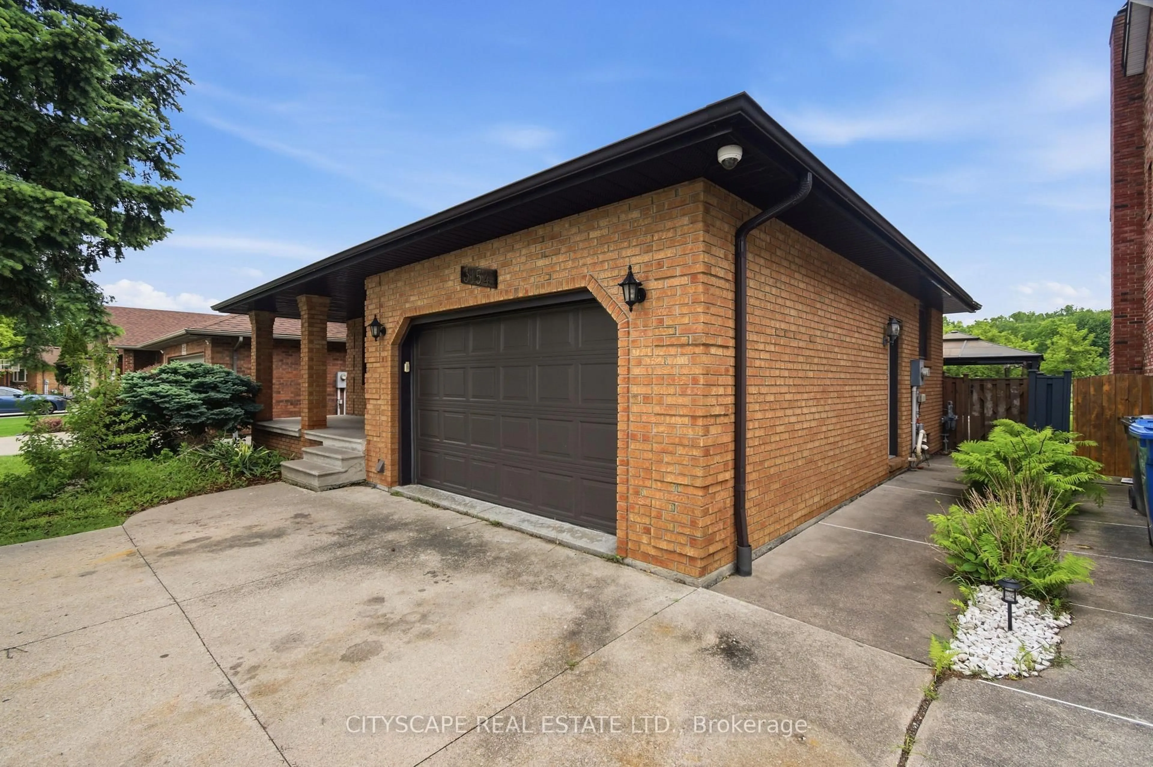 Home with brick exterior material, street for 3154 Fazio Dr, Windsor Ontario N9E 4G6