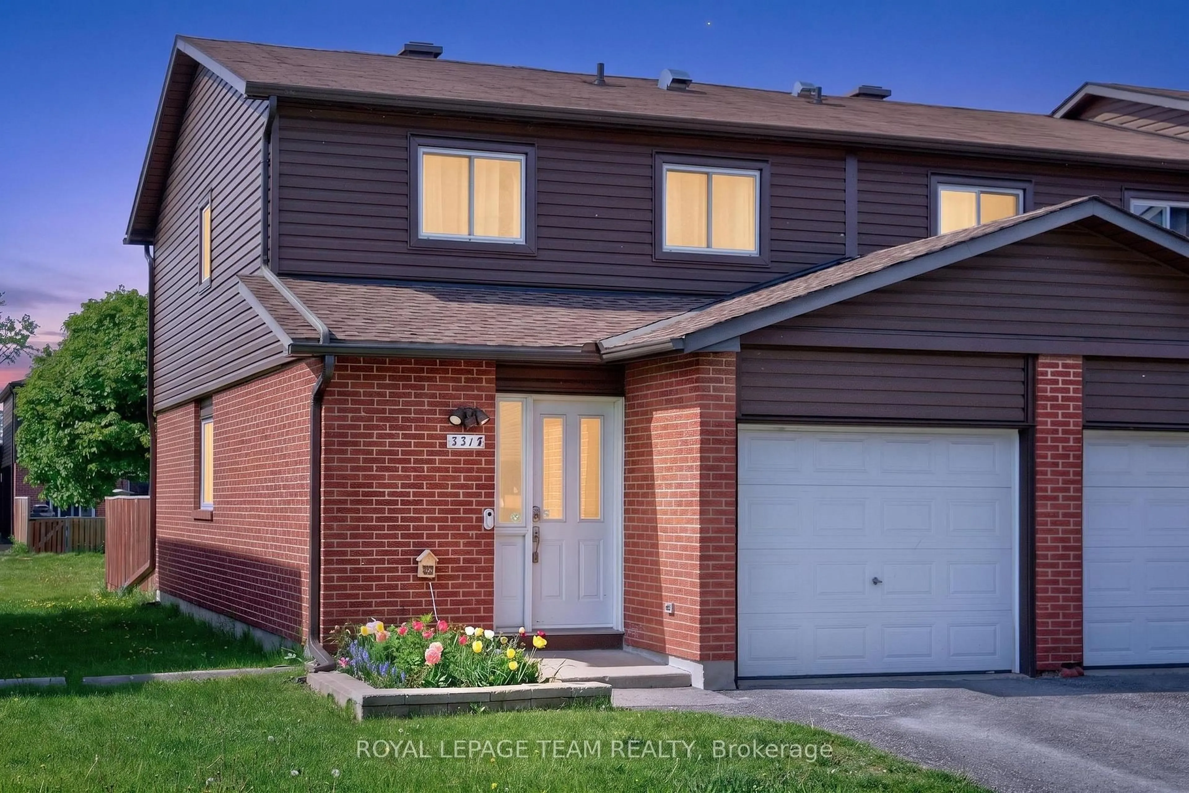 Home with brick exterior material, street for 3315 Hogarth Ave #37, Ottawa Ontario K1T 1S6