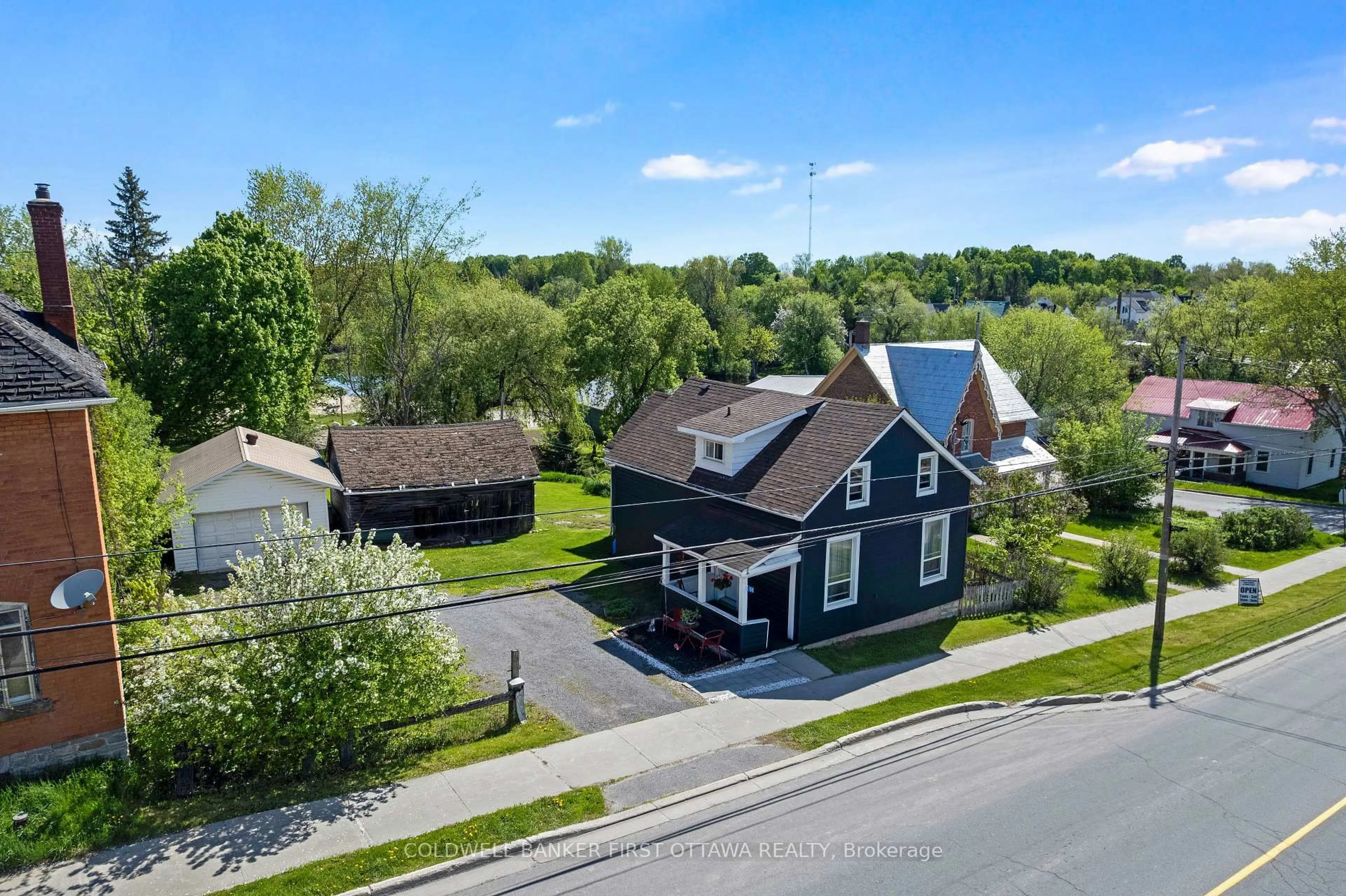A pic from outside/outdoor area/front of a property/back of a property/a pic from drone, street for 51 George St, Lanark Ontario K0G 1K0
