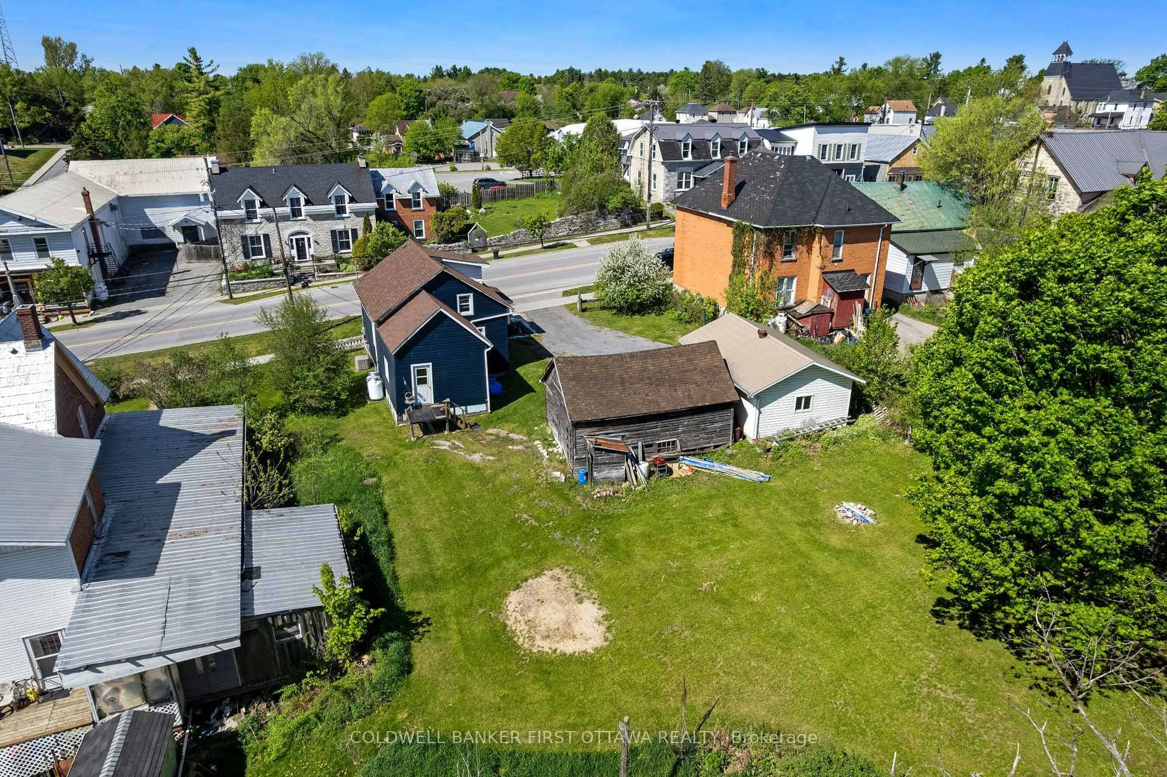 A pic from outside/outdoor area/front of a property/back of a property/a pic from drone, street for 51 George St, Lanark Ontario K0G 1K0