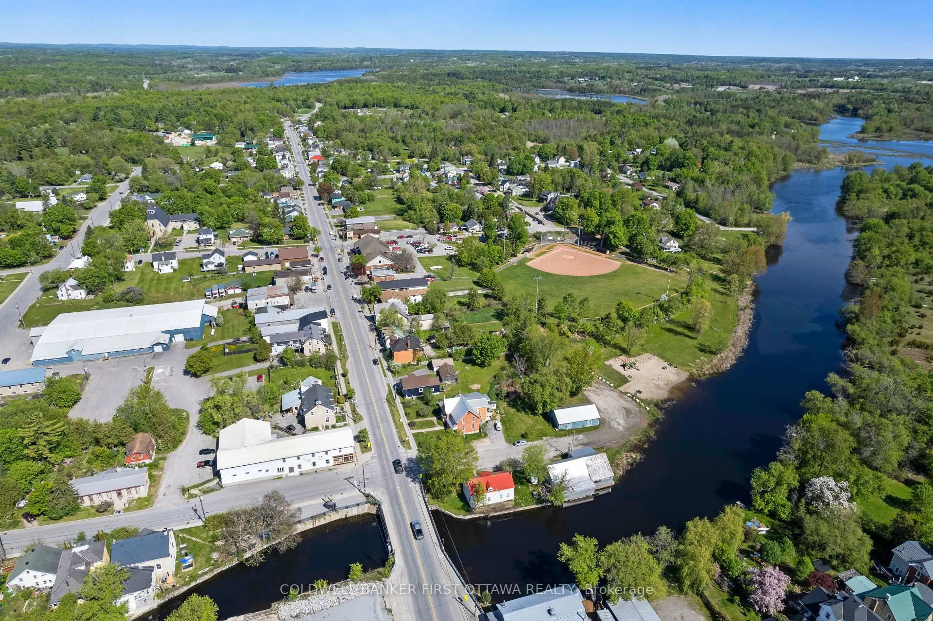 A pic from outside/outdoor area/front of a property/back of a property/a pic from drone, water/lake/river/ocean view for 51 George St, Lanark Ontario K0G 1K0