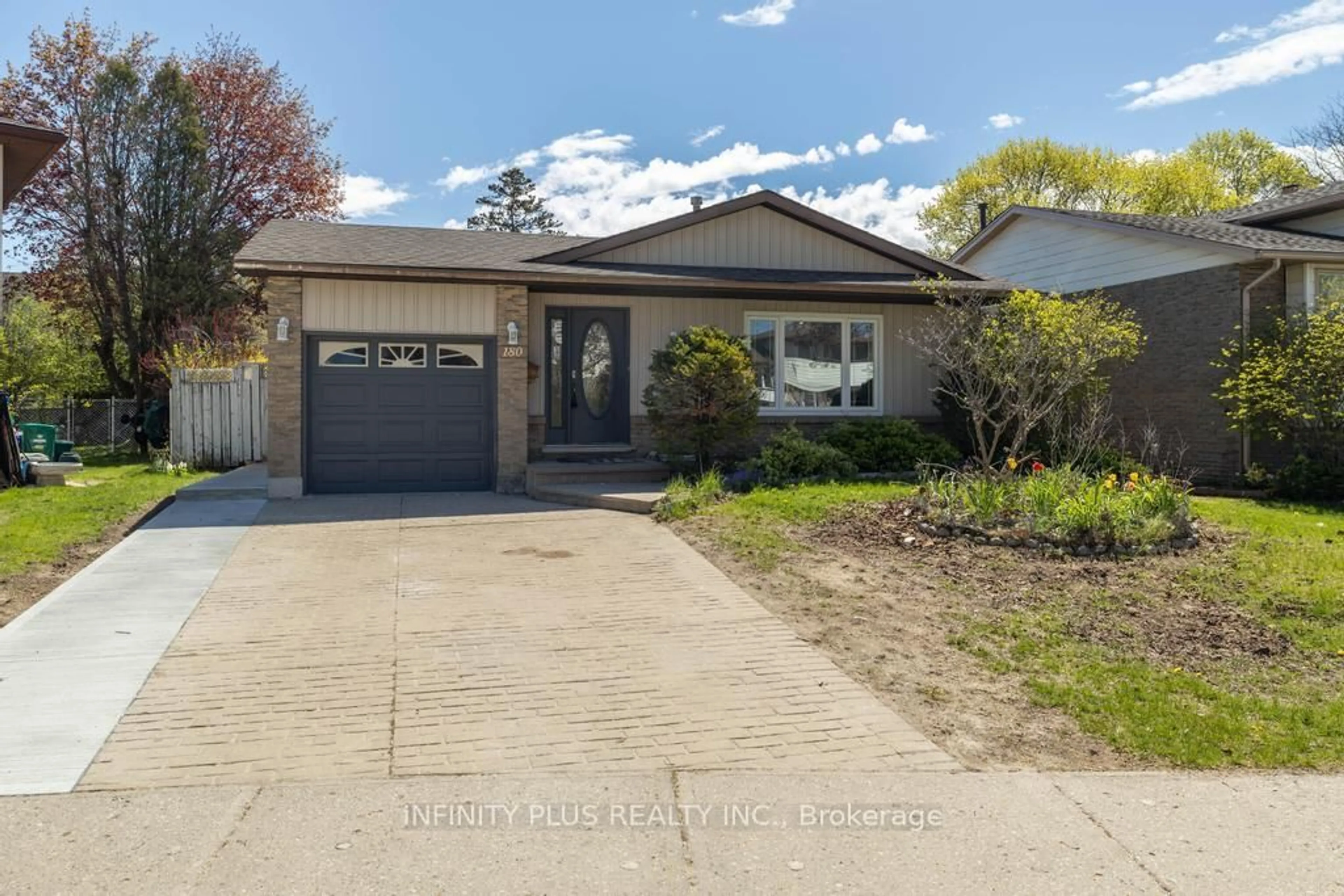 Home with brick exterior material, street for 180 St Jerome Cres, Kitchener Ontario N2C 2L2