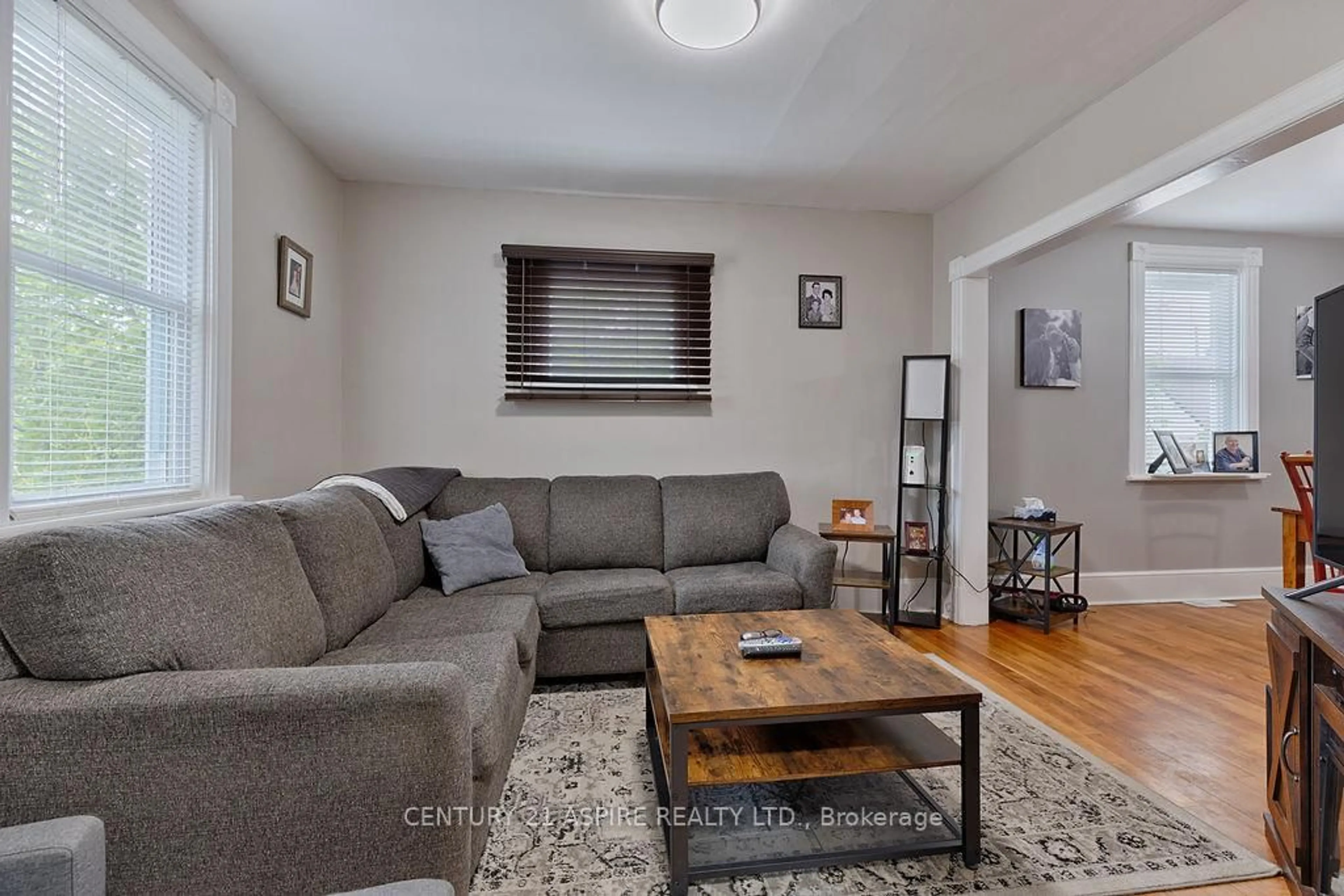 Living room with furniture, wood/laminate floor for 391 Third Ave, Pembroke Ontario K8A 5G9