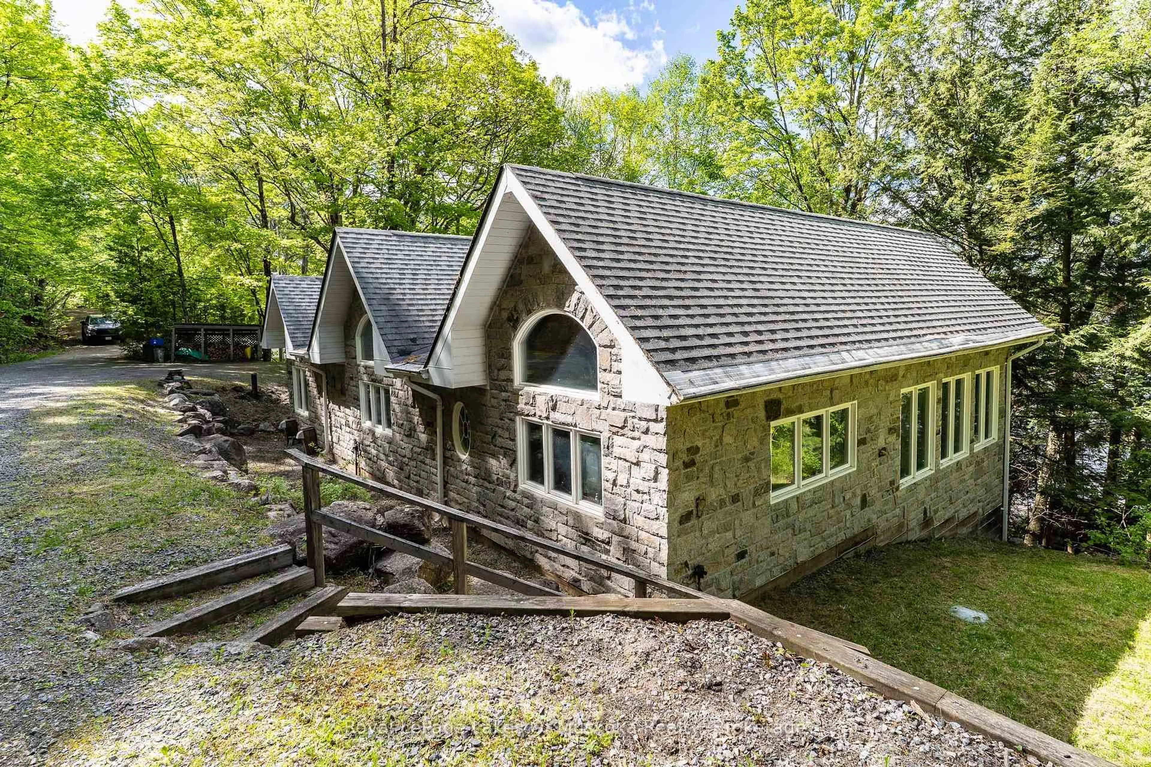 A pic from outside/outdoor area/front of a property/back of a property/a pic from drone, unknown for 1158 Shea Rd #42, Muskoka Lakes Ontario P0B 1M0