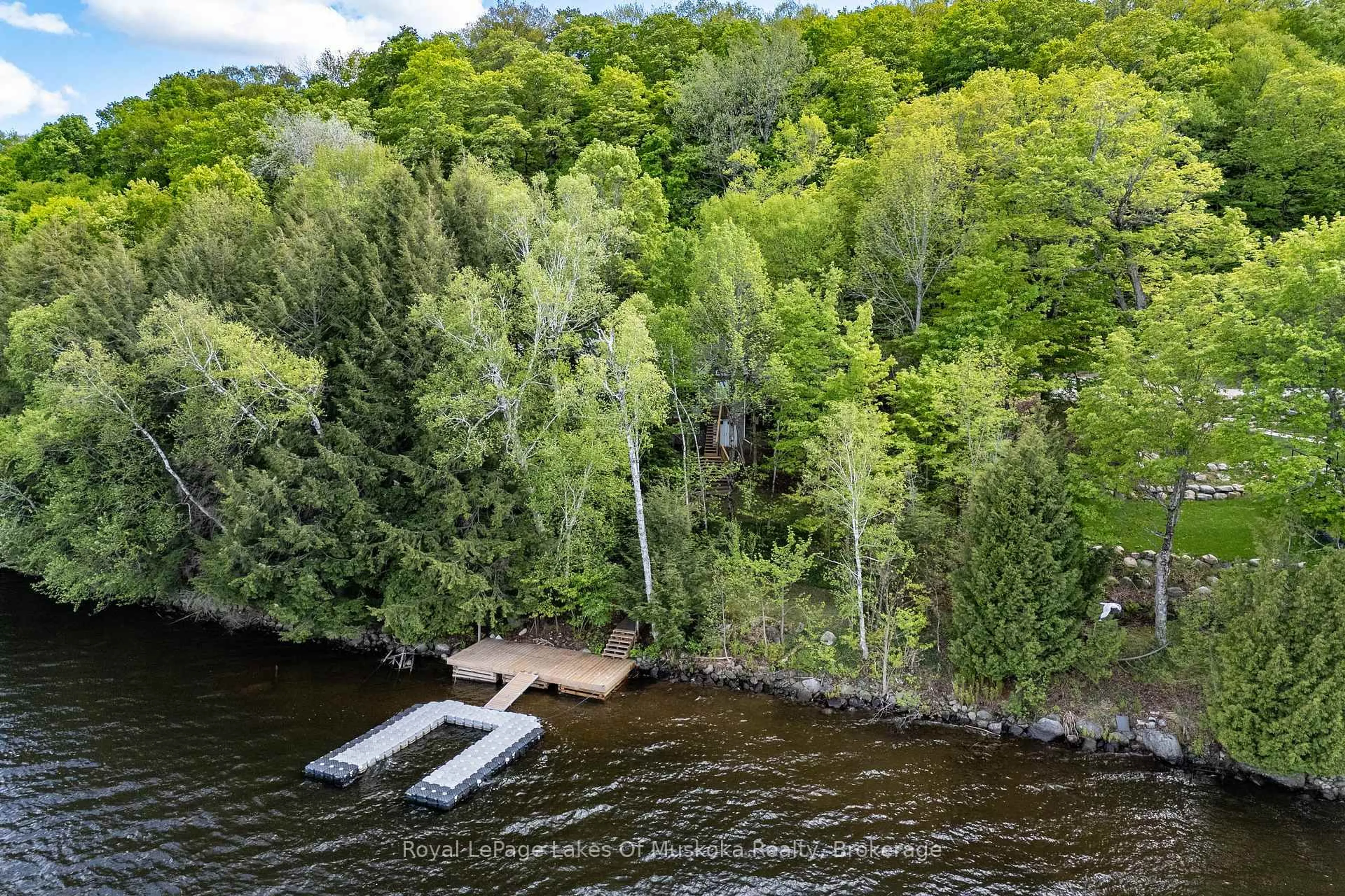 A pic from outside/outdoor area/front of a property/back of a property/a pic from drone, water/lake/river/ocean view for 1158 Shea Rd #42, Muskoka Lakes Ontario P0B 1M0
