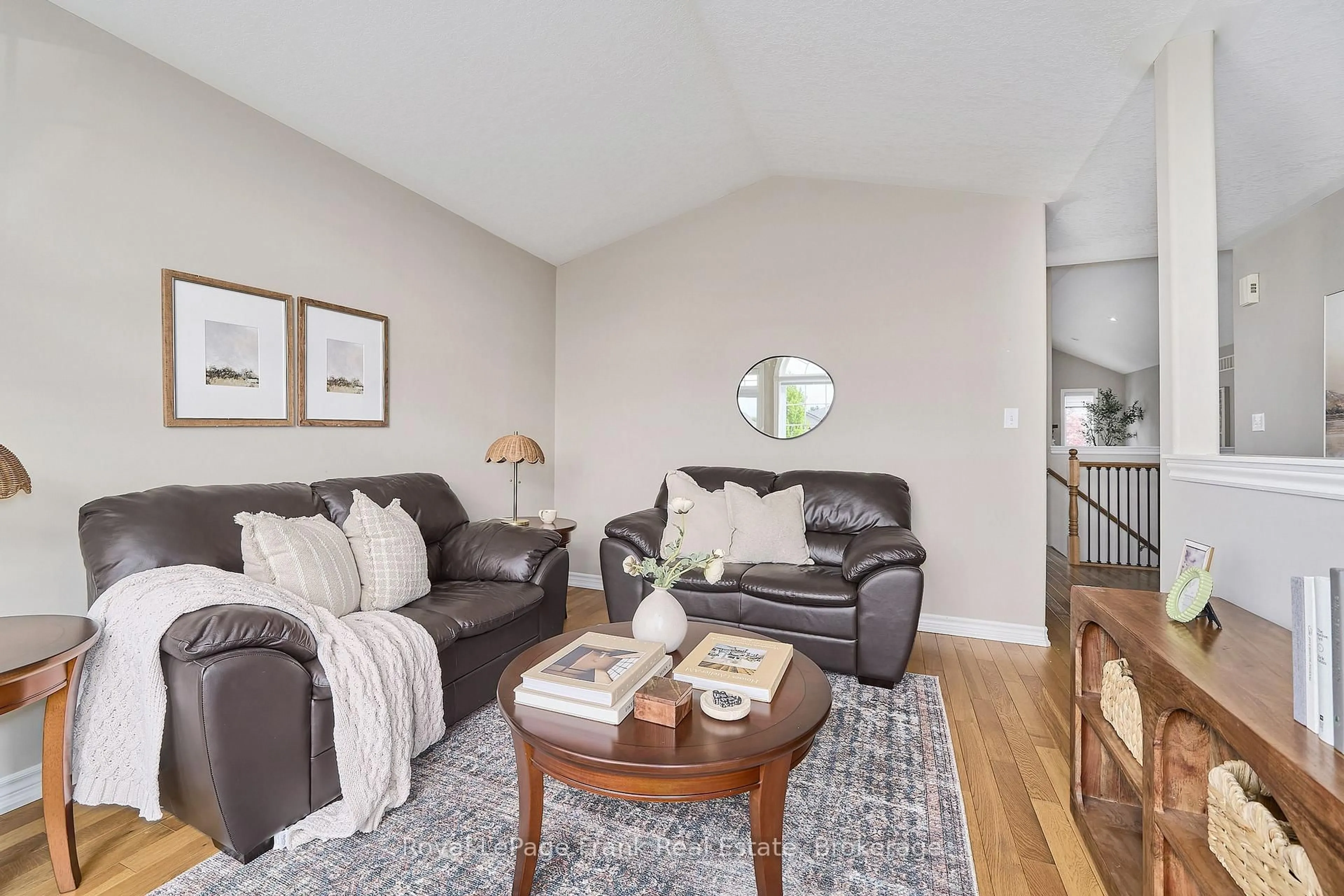 Living room with furniture, wood/laminate floor for 11 Fox Den Dr, Brighton Ontario K0K 1H0