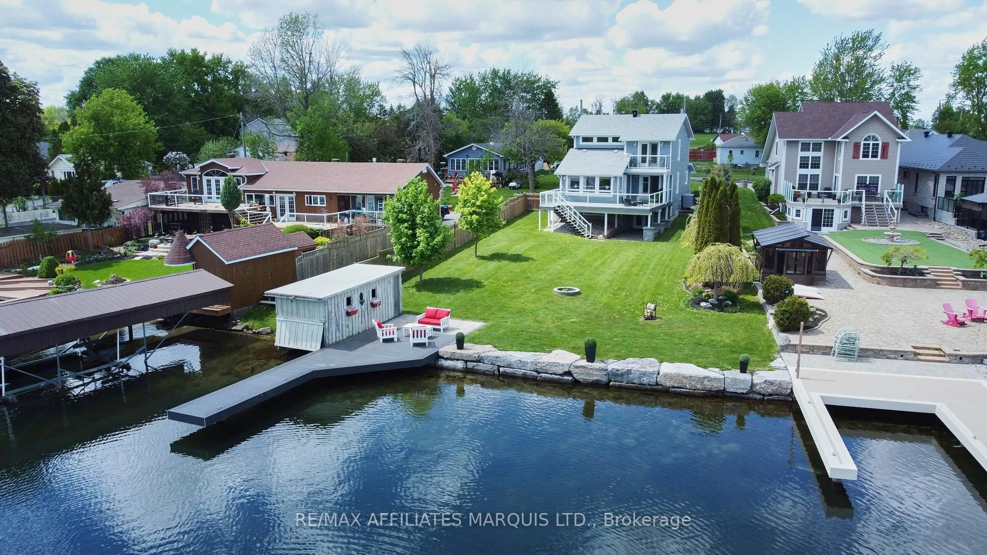 A pic from outside/outdoor area/front of a property/back of a property/a pic from drone, water/lake/river/ocean view for 19414 Malibu Lane, South Glengarry Ontario K0C 2E0