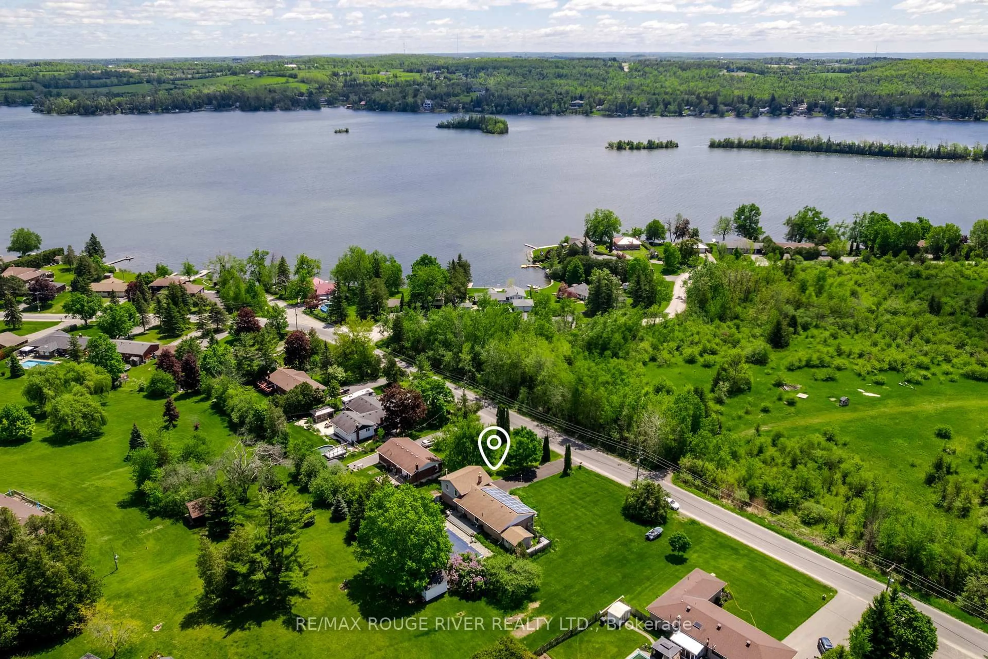 A pic from outside/outdoor area/front of a property/back of a property/a pic from drone, water/lake/river/ocean view for 264 Clonakilty Line, Selwyn Ontario K0L 1T0