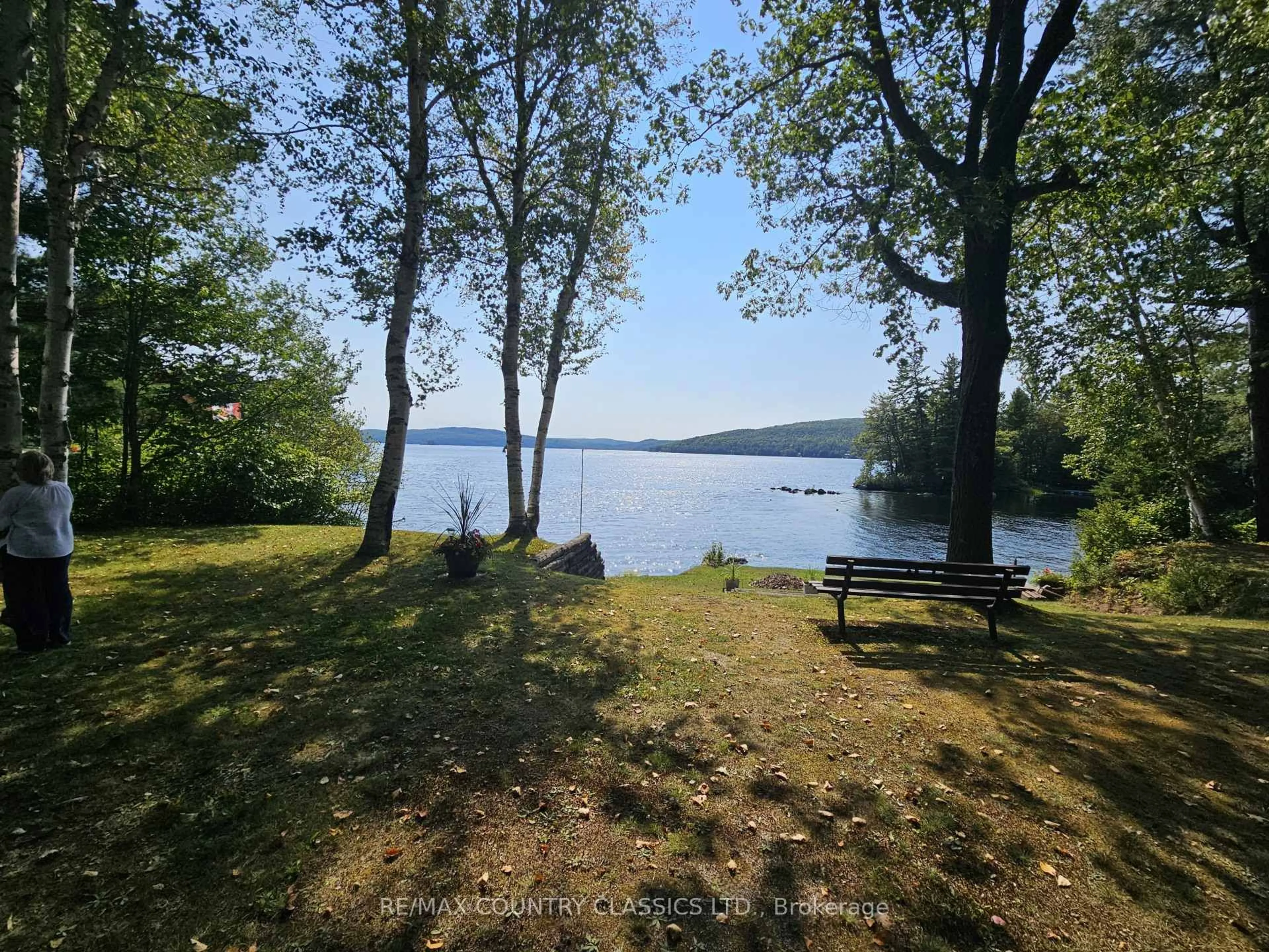 A pic from outside/outdoor area/front of a property/back of a property/a pic from drone, water/lake/river/ocean view for 150 Golfers Lane, Barry's Bay Ontario K0J 1B0