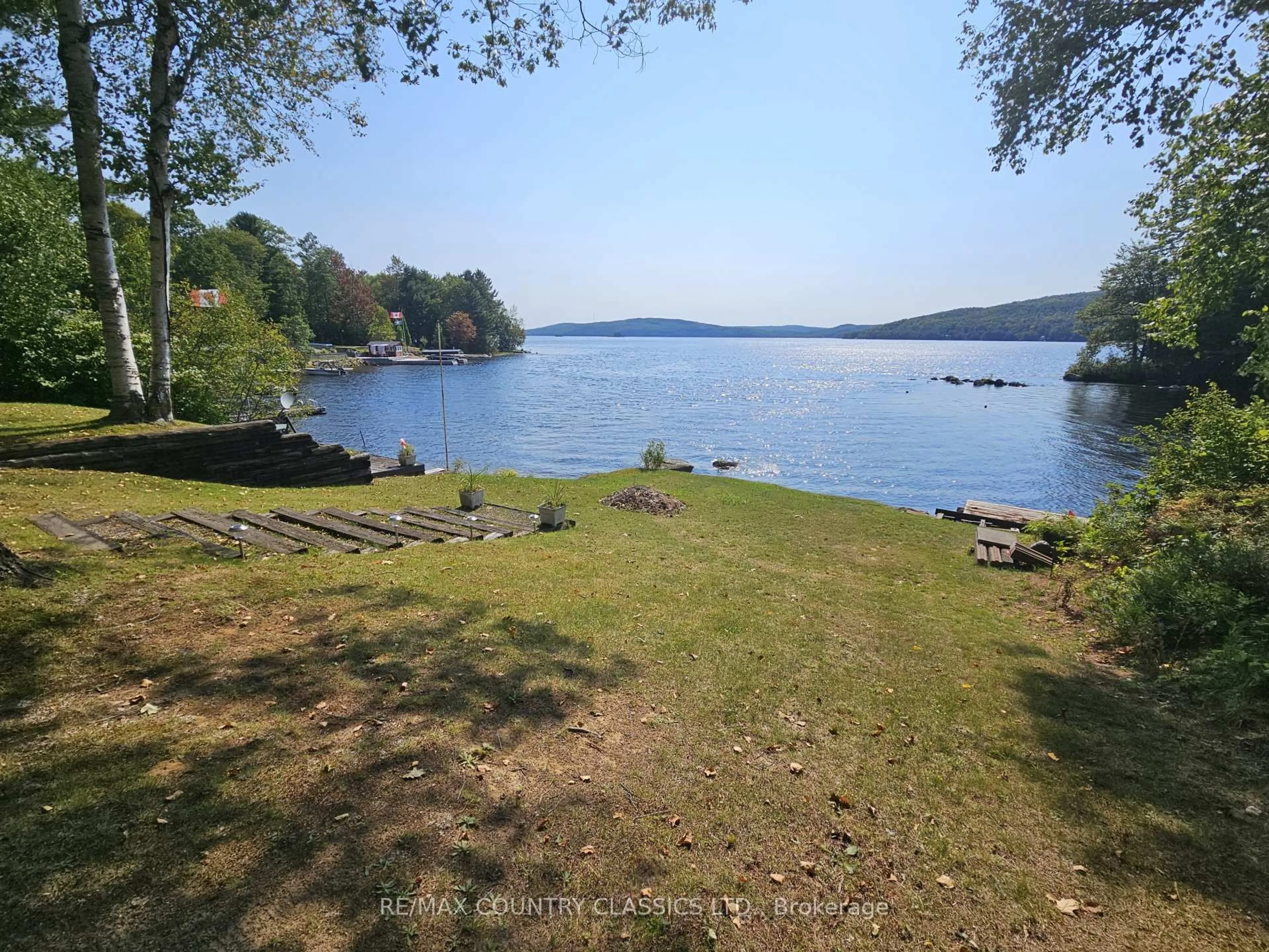 A pic from outside/outdoor area/front of a property/back of a property/a pic from drone, water/lake/river/ocean view for 150 Golfers Lane, Barry's Bay Ontario K0J 1B0