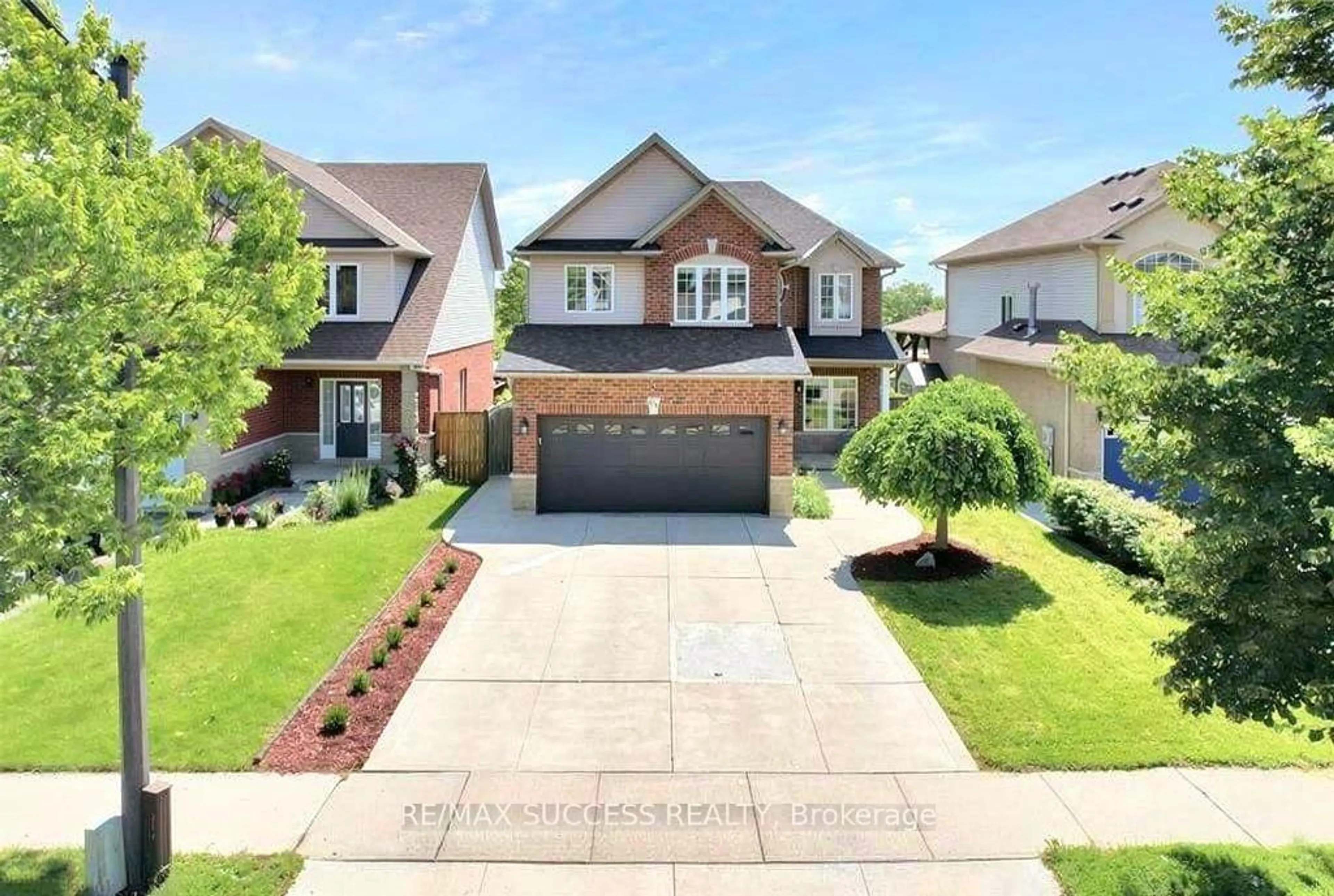 Home with brick exterior material, street for 64 Garth Trails Cres, Hamilton Ontario L9B 2X1