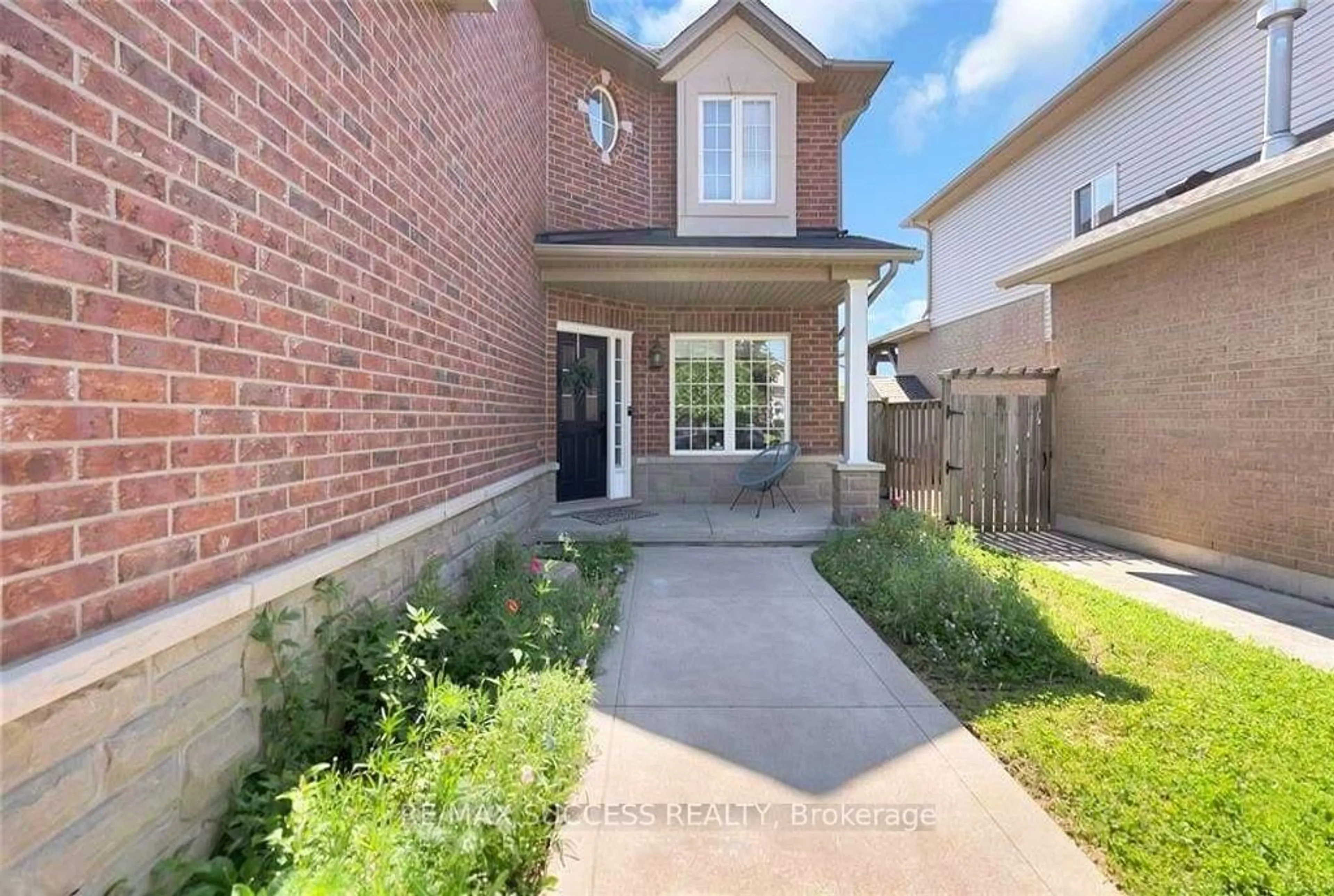 Home with brick exterior material, street for 64 Garth Trails Cres, Hamilton Ontario L9B 2X1