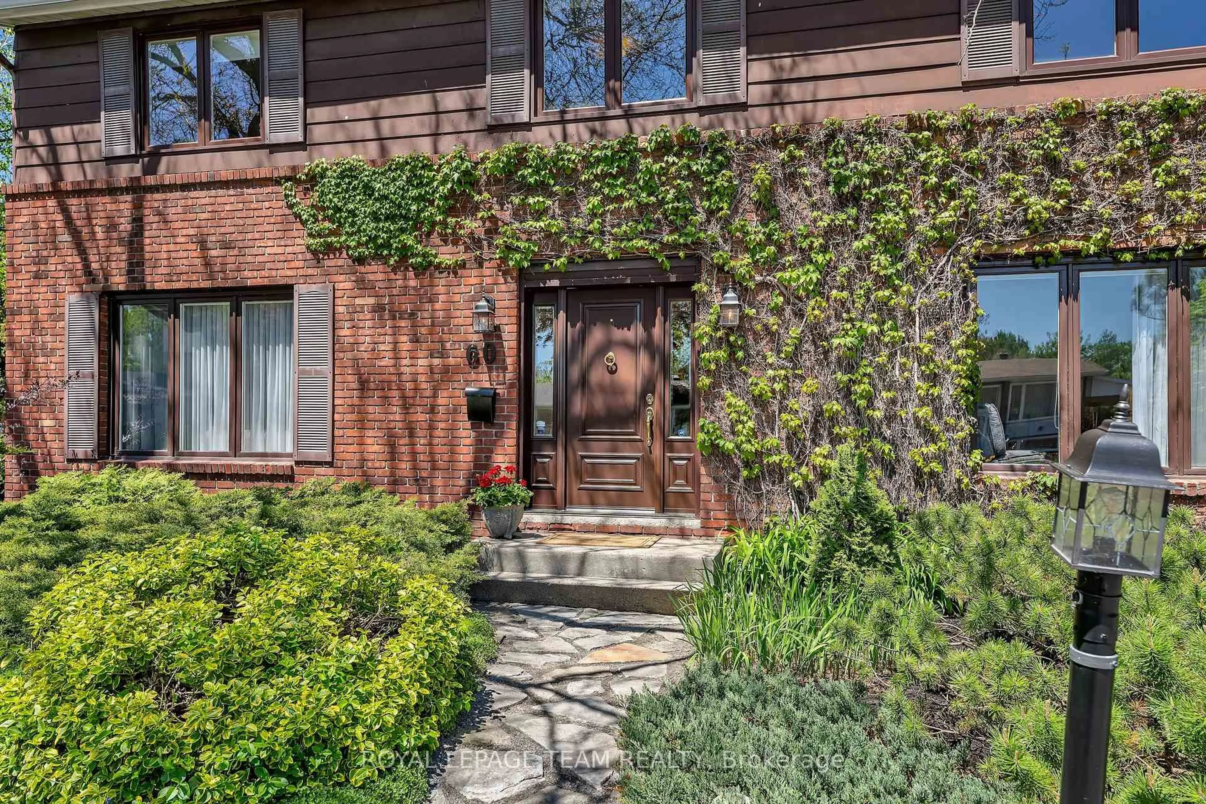 Home with brick exterior material, street for 60 Horner Dr, Ottawa Ontario K2H 5E9