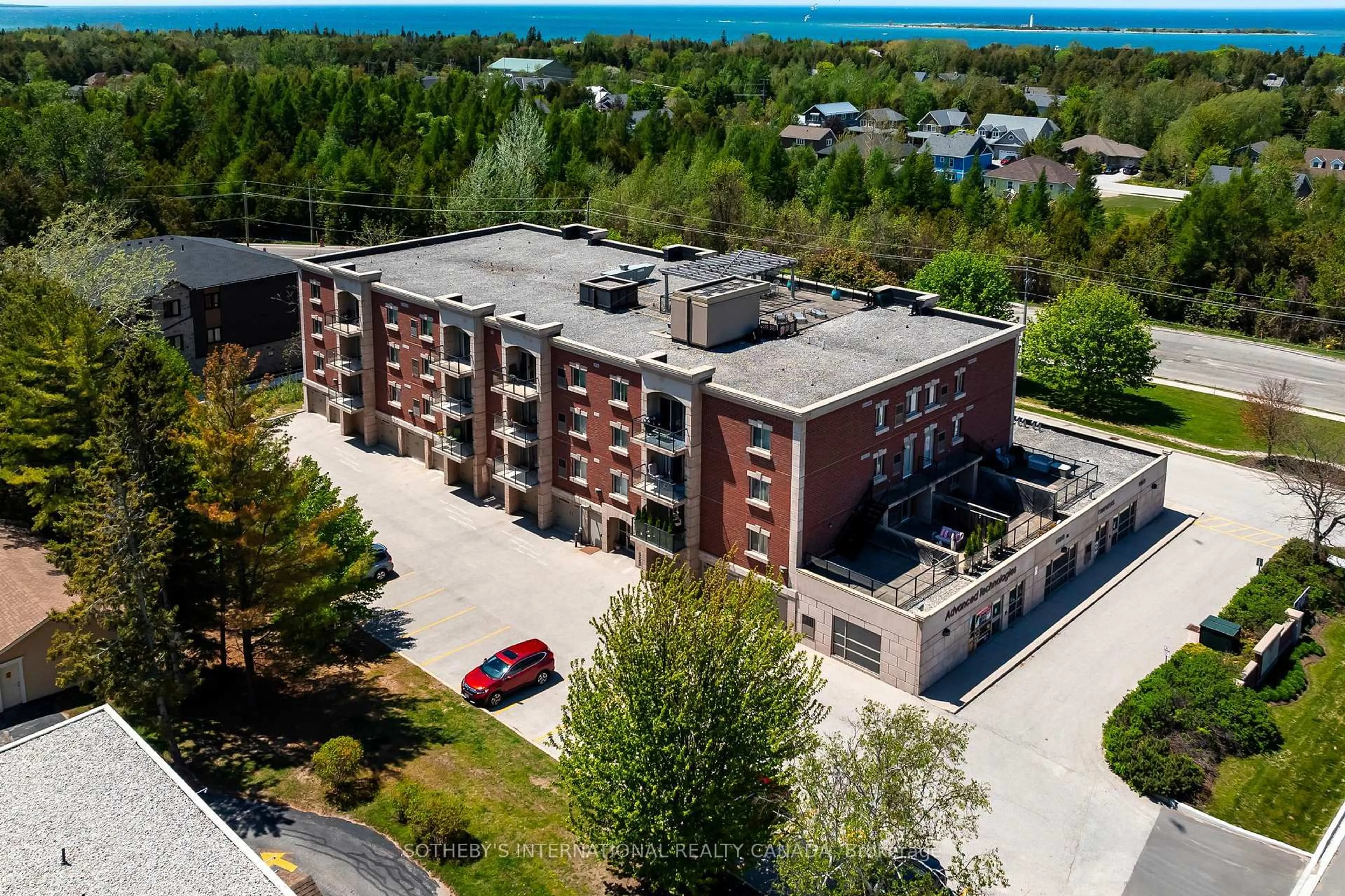 A pic from outside/outdoor area/front of a property/back of a property/a pic from drone, building for 221 Adelaide St #201, Saugeen Shores Ontario N0H 2L0