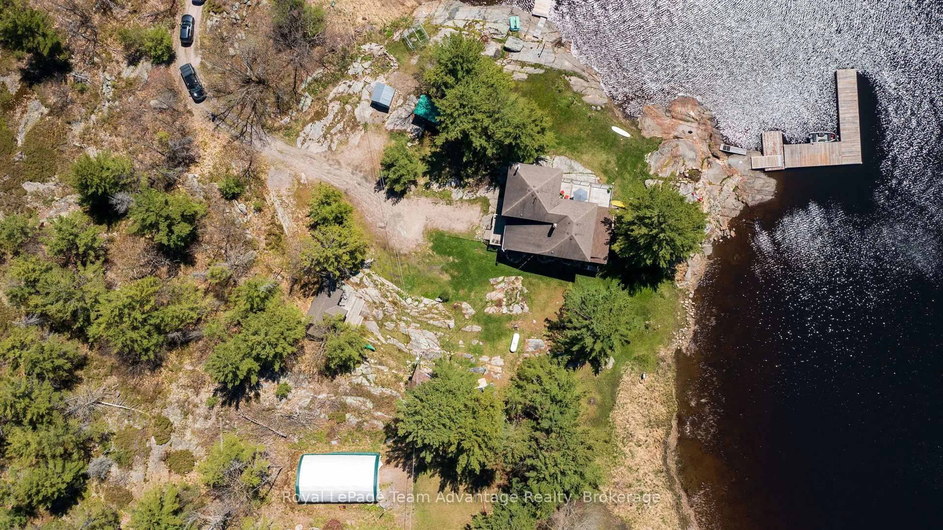 A pic from outside/outdoor area/front of a property/back of a property/a pic from drone, water/lake/river/ocean view for 121 Rattlebear Dr, The Archipelago Ontario P0G 1K0