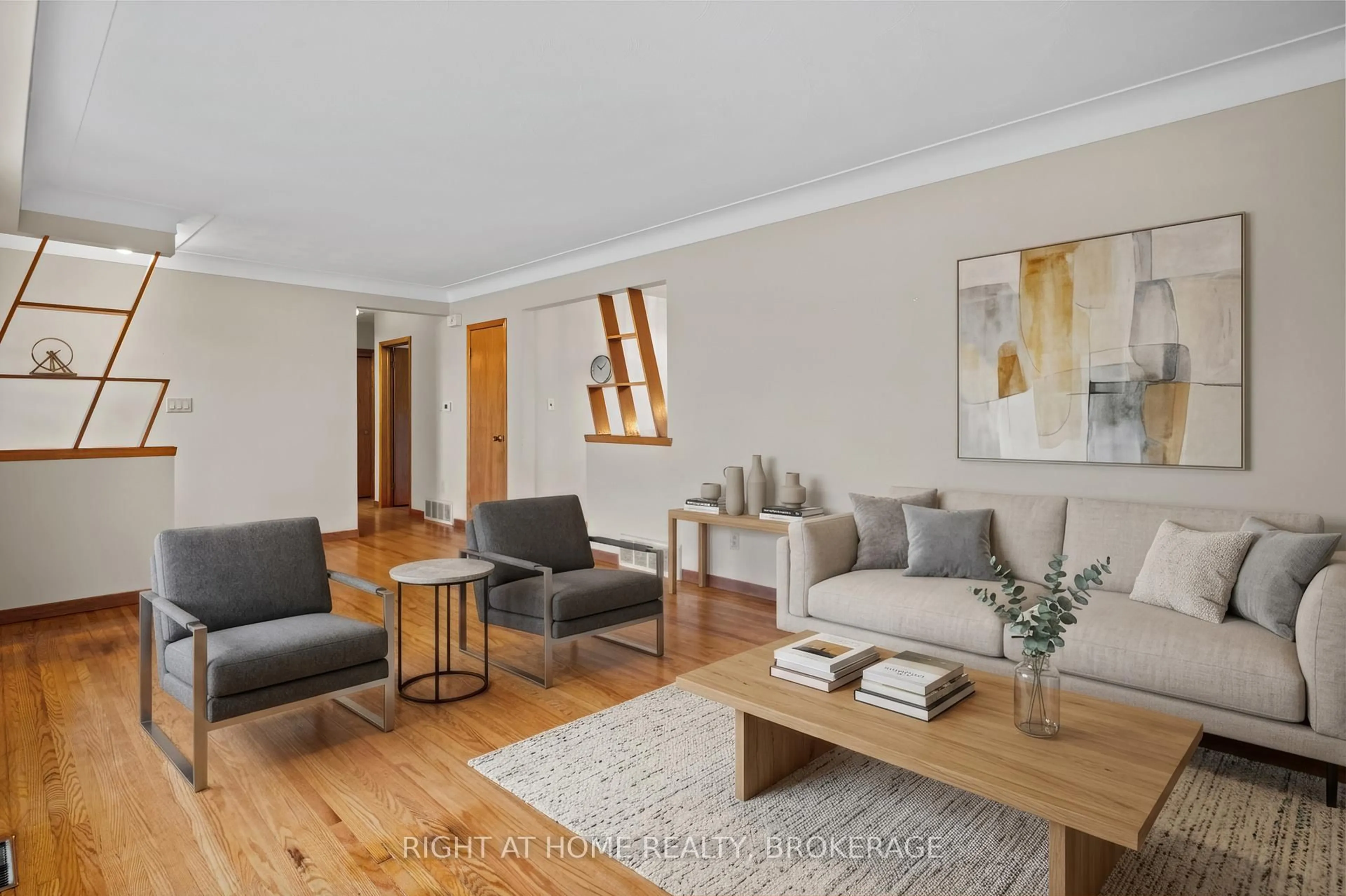 Living room with furniture, wood/laminate floor for 12 Lorne Ave, Grimsby Ontario L3M 2H5