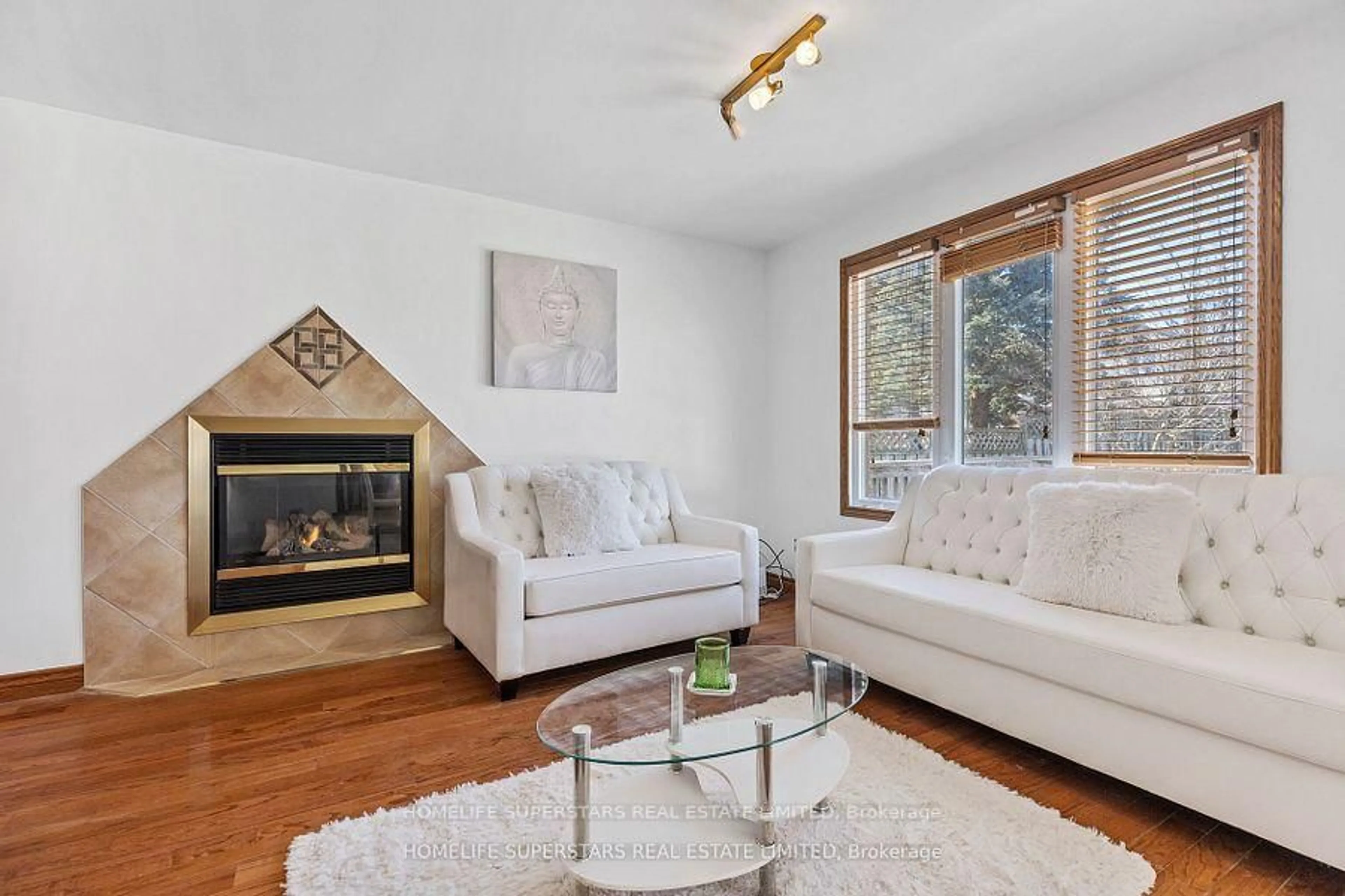 Living room with furniture, wood/laminate floor for 1565 Hastings Dr, London North Ontario N5X 3C5