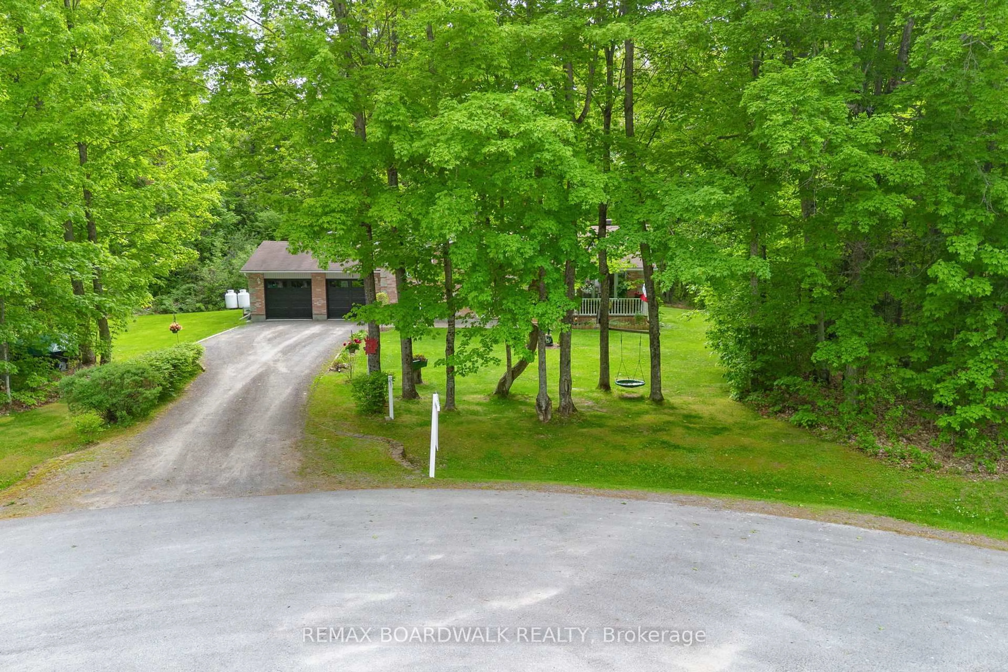 A pic from outside/outdoor area/front of a property/back of a property/a pic from drone, forest/trees view for 133 Hummingbird Lane, Carleton Place Ontario K7C 3P2