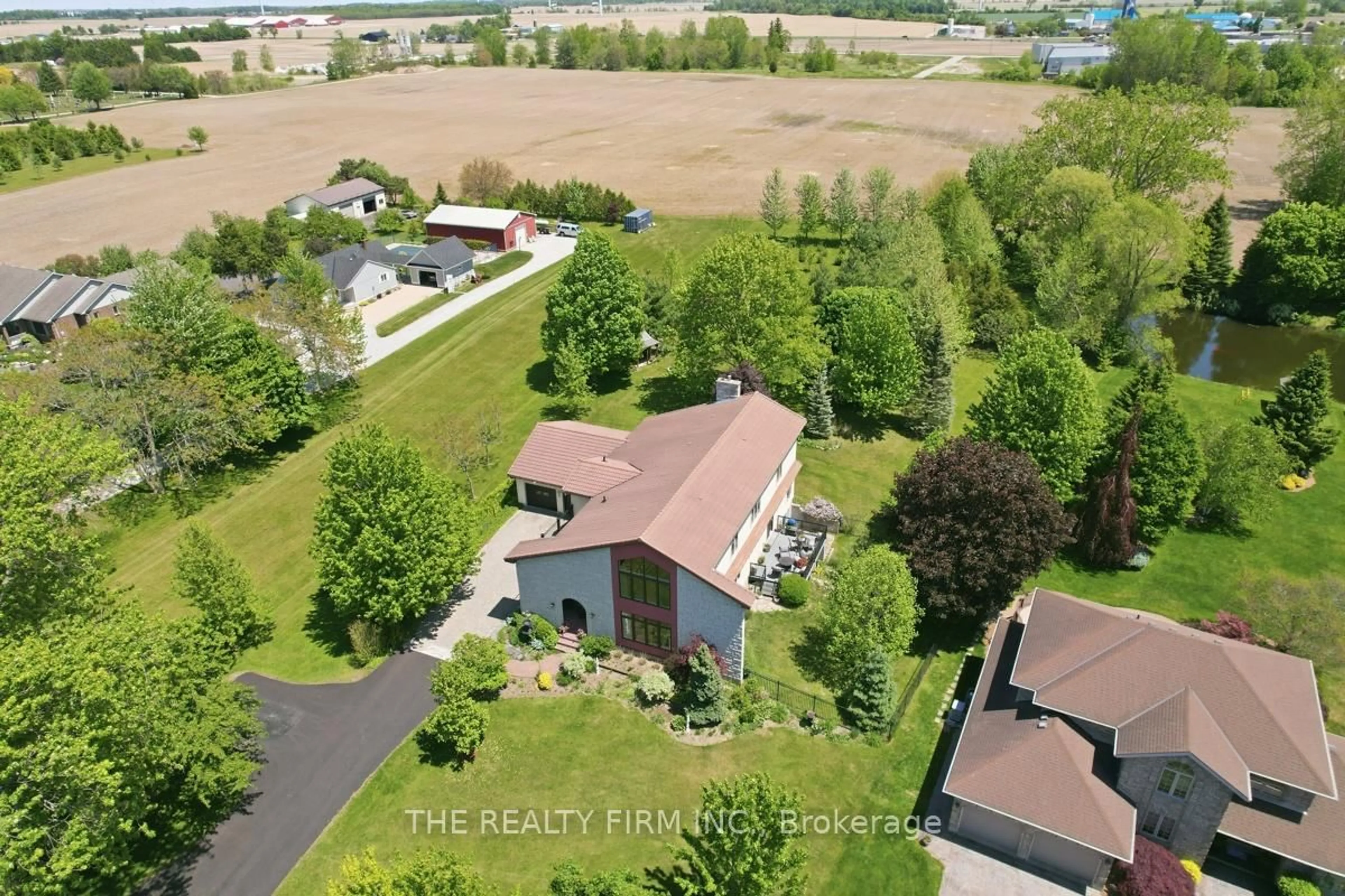 A pic from outside/outdoor area/front of a property/back of a property/a pic from drone, unknown for 15 Beechwood Ave, Lambton Shores Ontario N0N 1J0