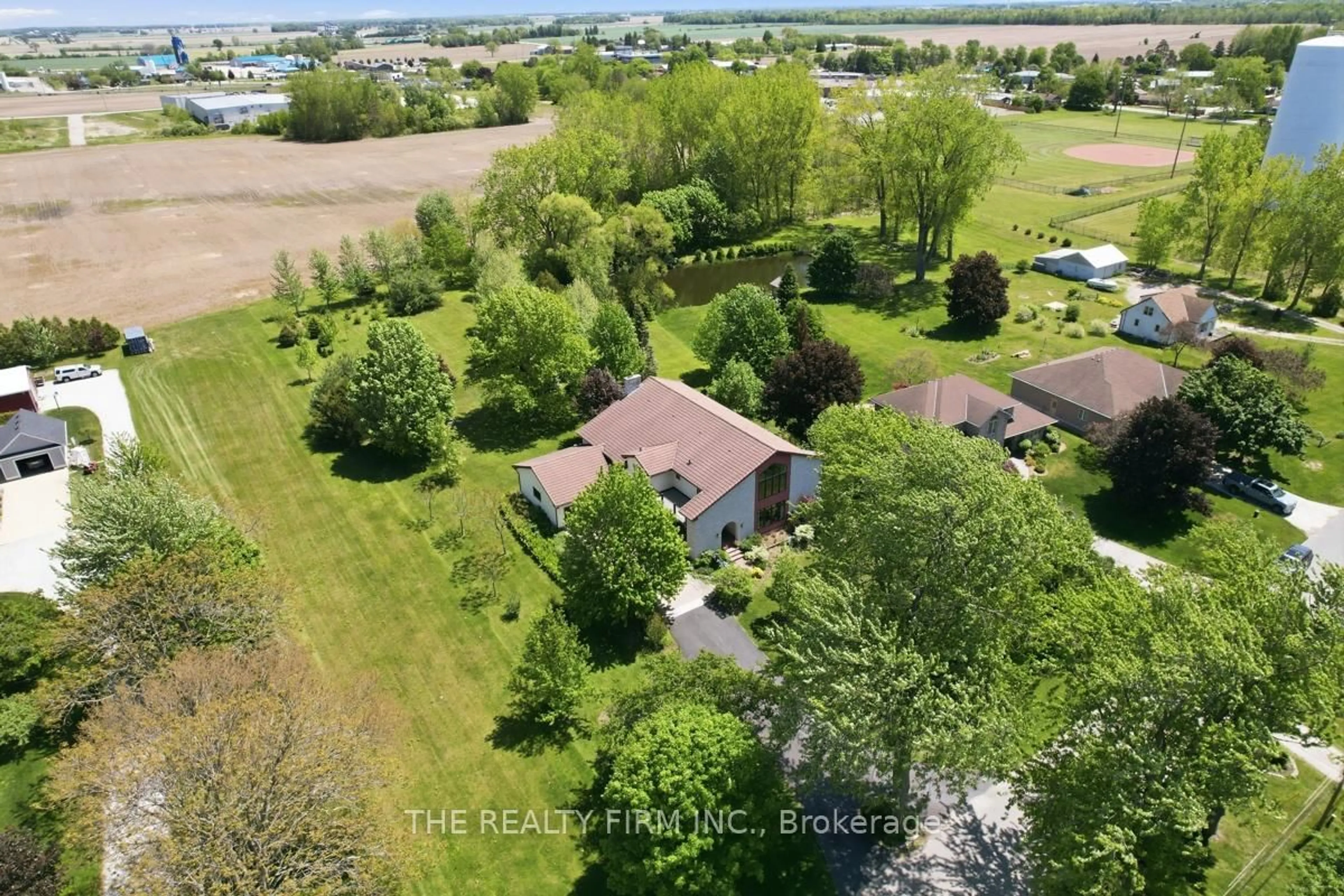 A pic from outside/outdoor area/front of a property/back of a property/a pic from drone, water/lake/river/ocean view for 15 Beechwood Ave, Lambton Shores Ontario N0N 1J0